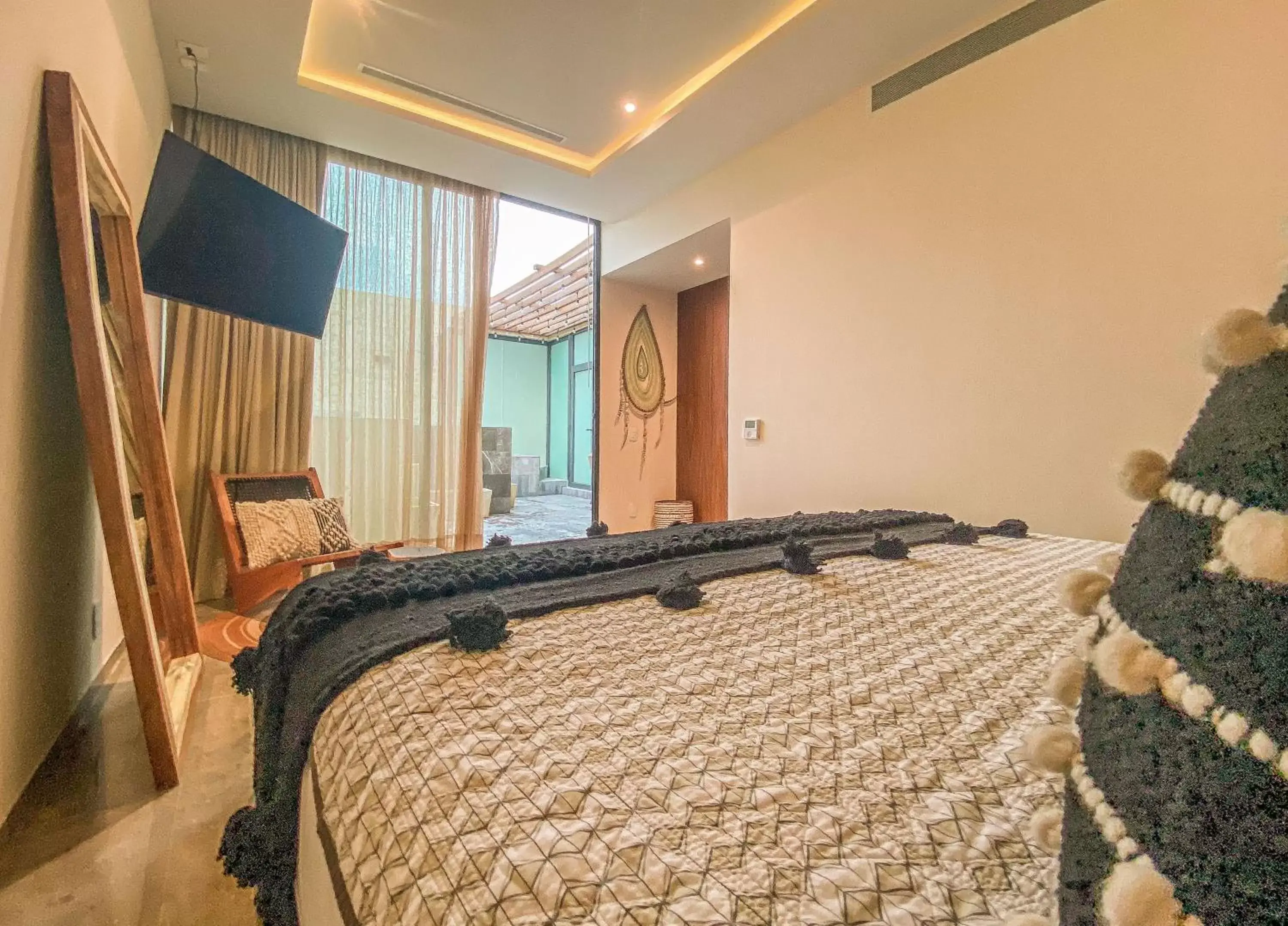 Bed in MISTIQ Tulum Luxury Apartments