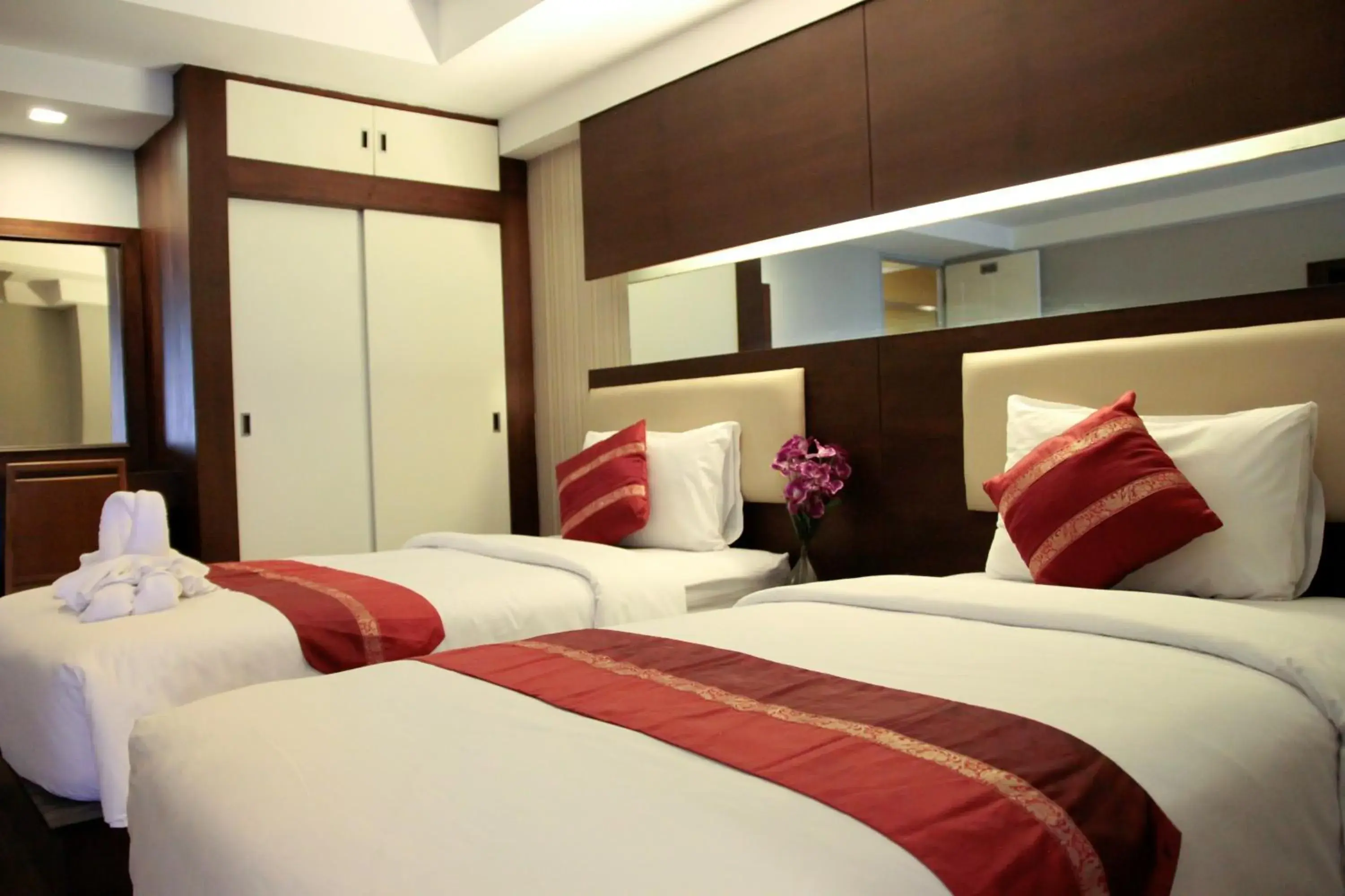 Bed in Tara Garden Hotel