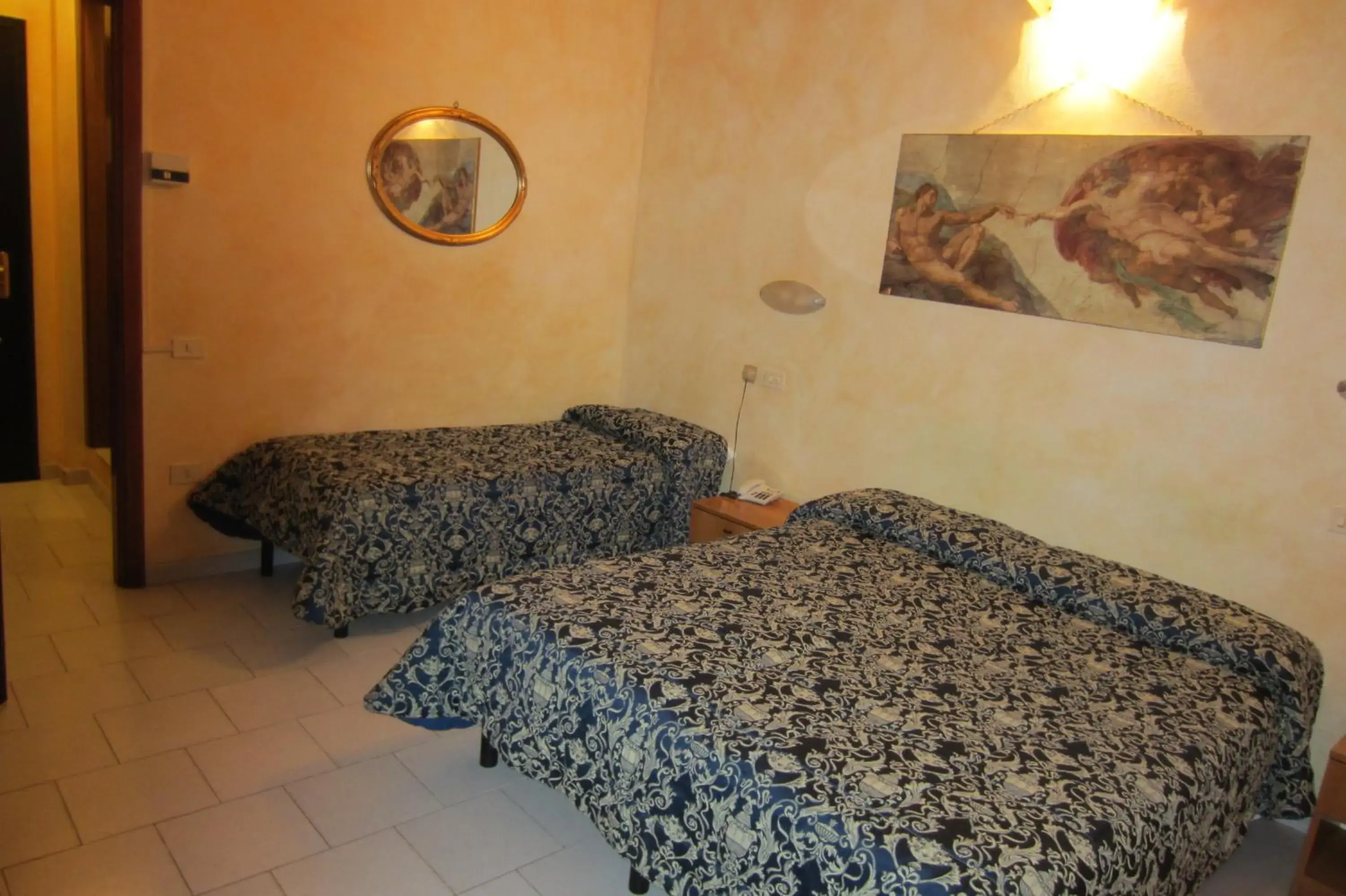 Bed in Hotel Lombardi