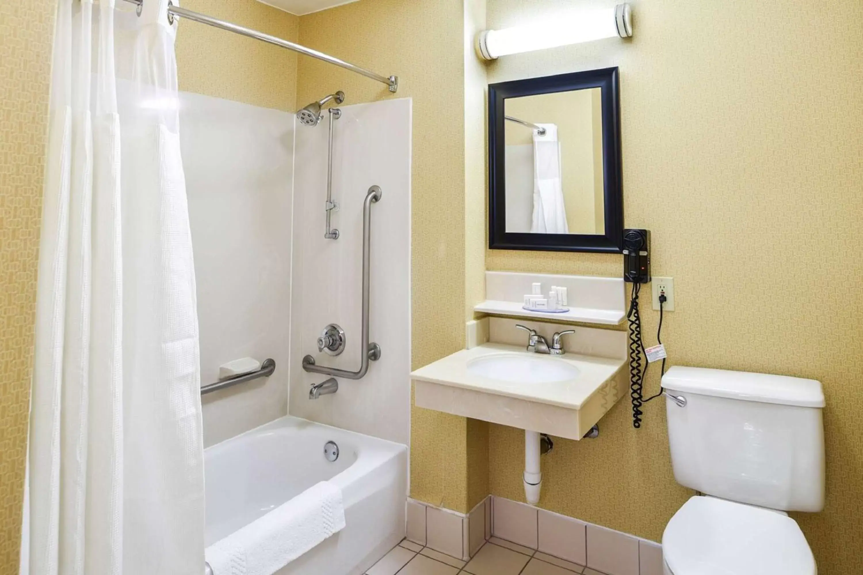 Bathroom in SureStay Hotel by Best Western Ontario Airport
