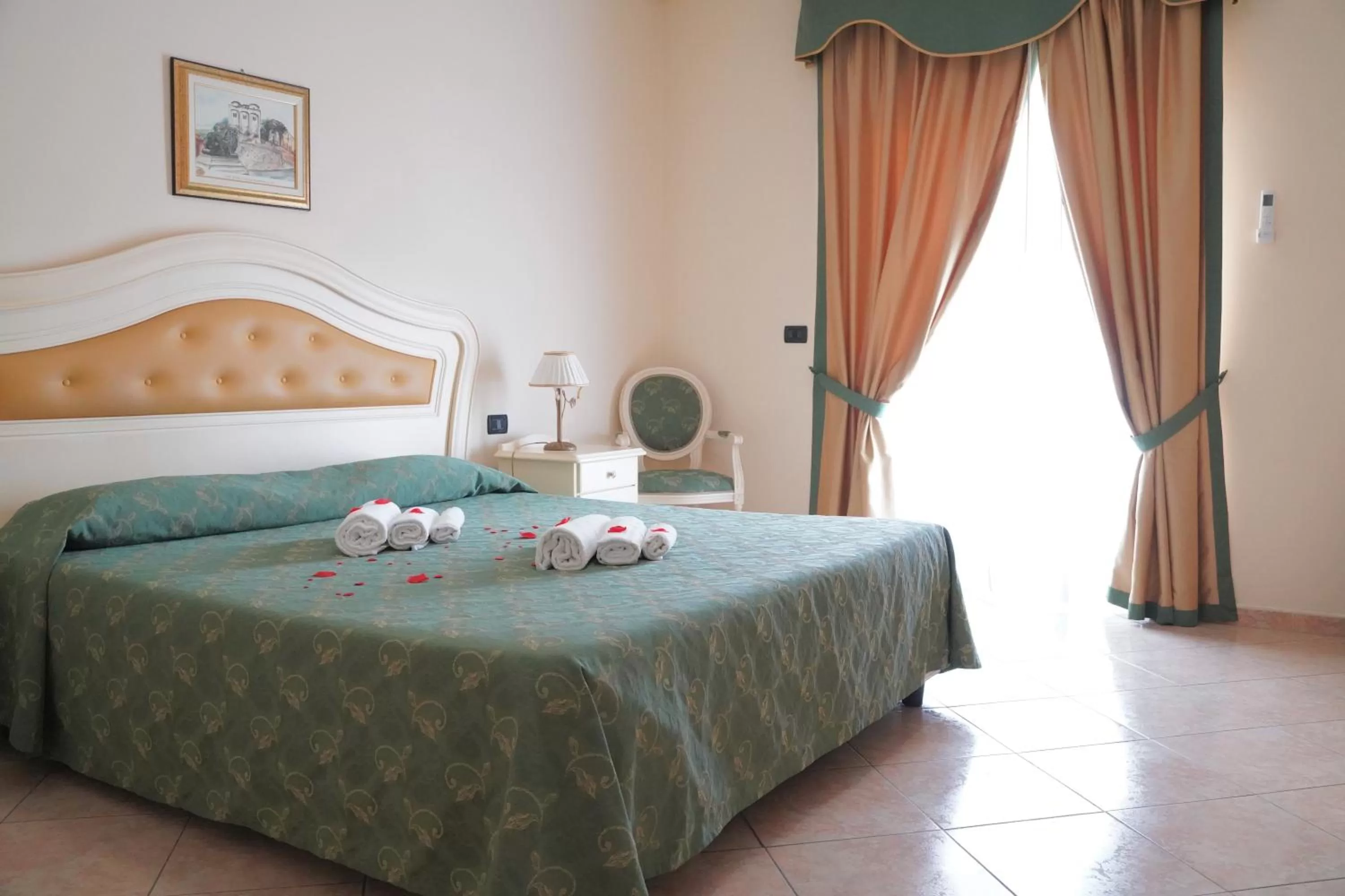 Bedroom in Hotel Roscianum Welness SPA