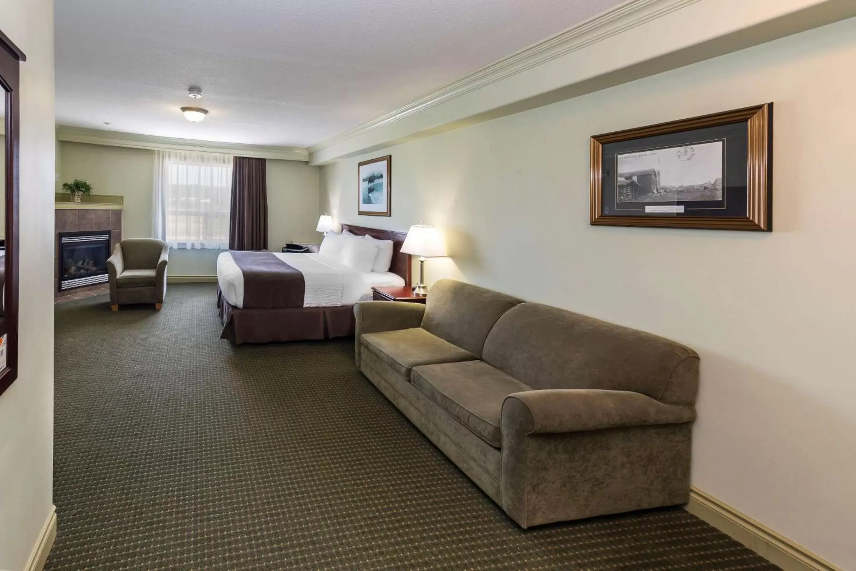 Bedroom, Seating Area in Quality Inn & Suites