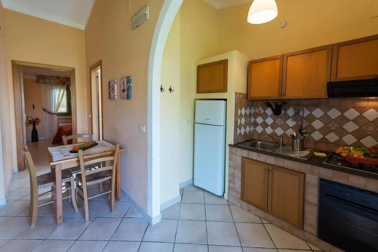 Dining area, Kitchen/Kitchenette in Residence Torre Delle Viole