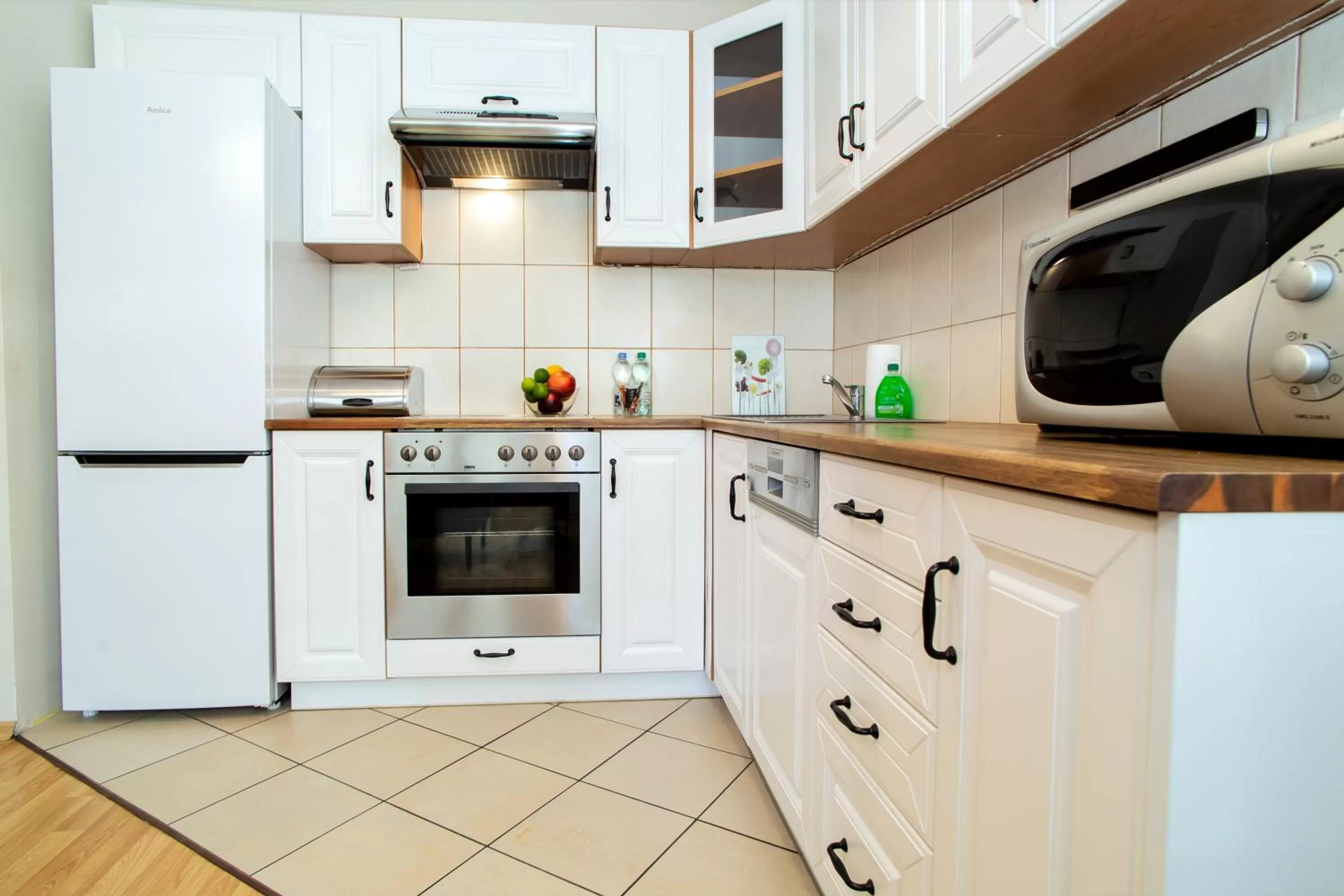 kitchen in Warsaw Apartments - Apartamenty Wilanów