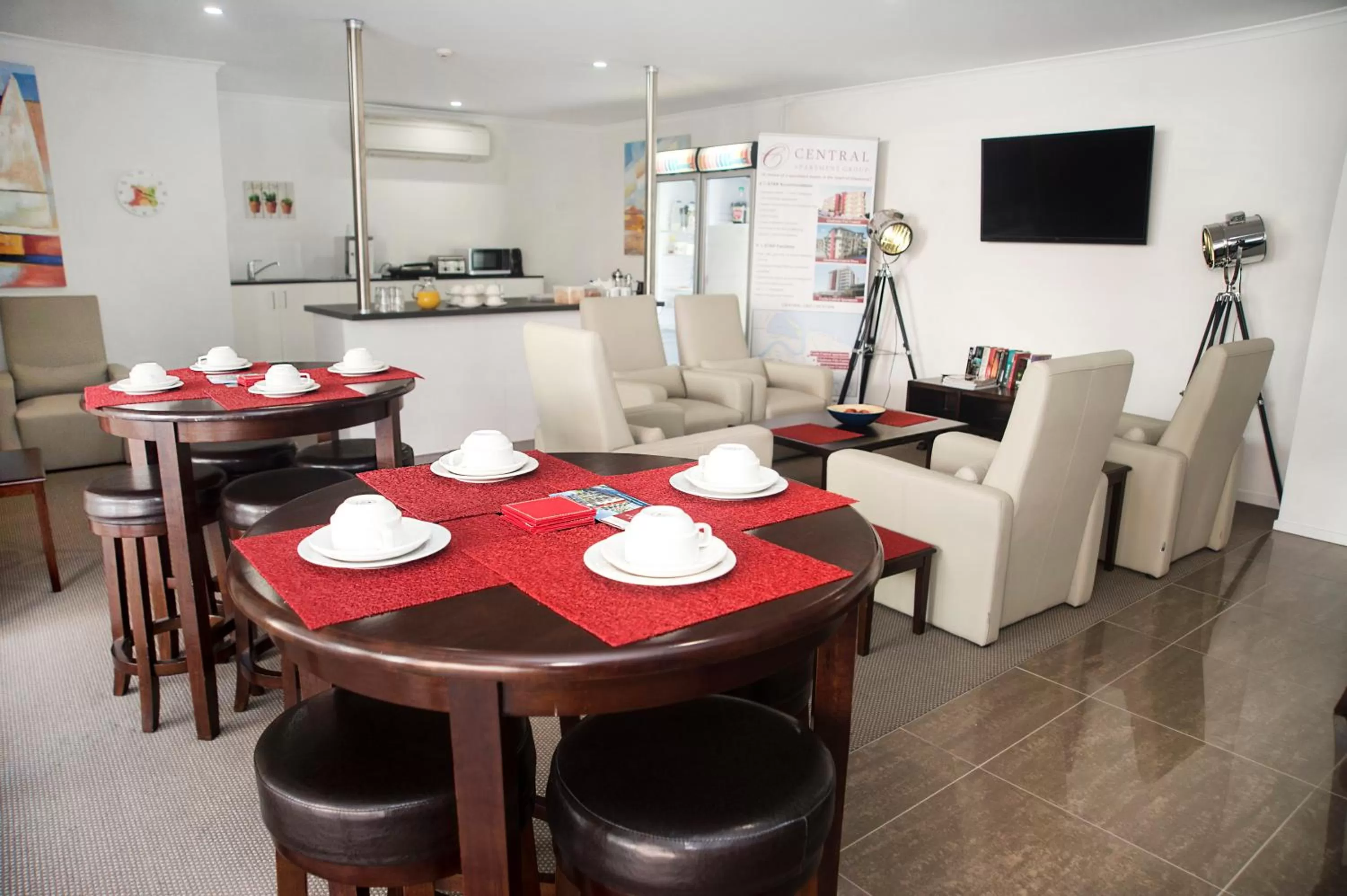 Communal lounge/ TV room in Gladstone Central Plaza Official