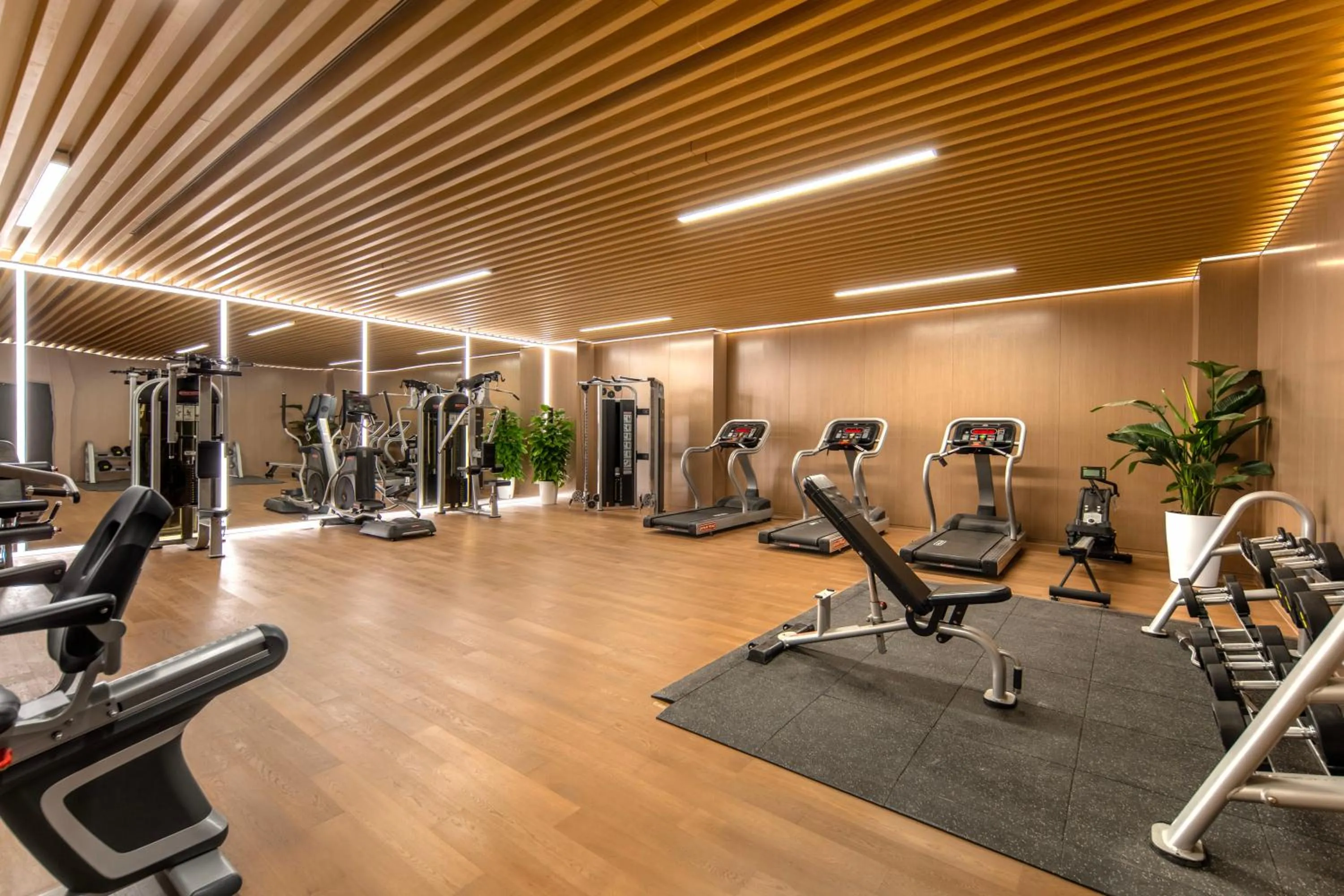 Fitness centre/facilities in Novotel Atlantis Shanghai - Enjoy our great-valued breakfast in our rooftop revolving restaurant with a stunning river view & utilize our FREE self-serviced laundry