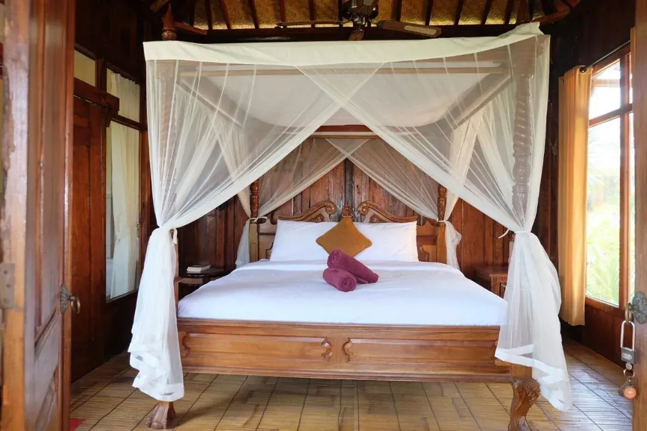 Bed in Ganesha Ubud Inn