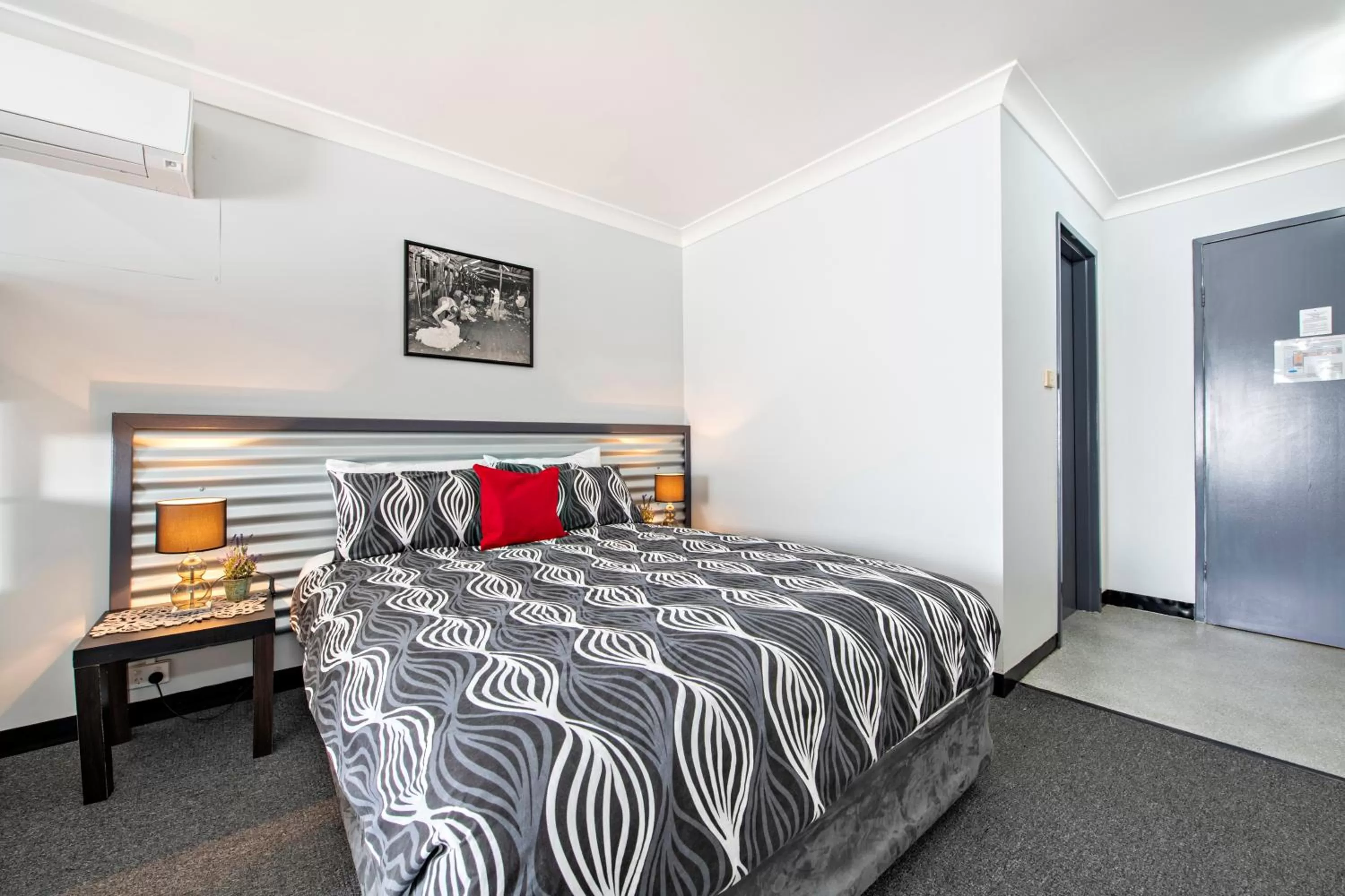 Bed in Shearing Shed Motor Inn