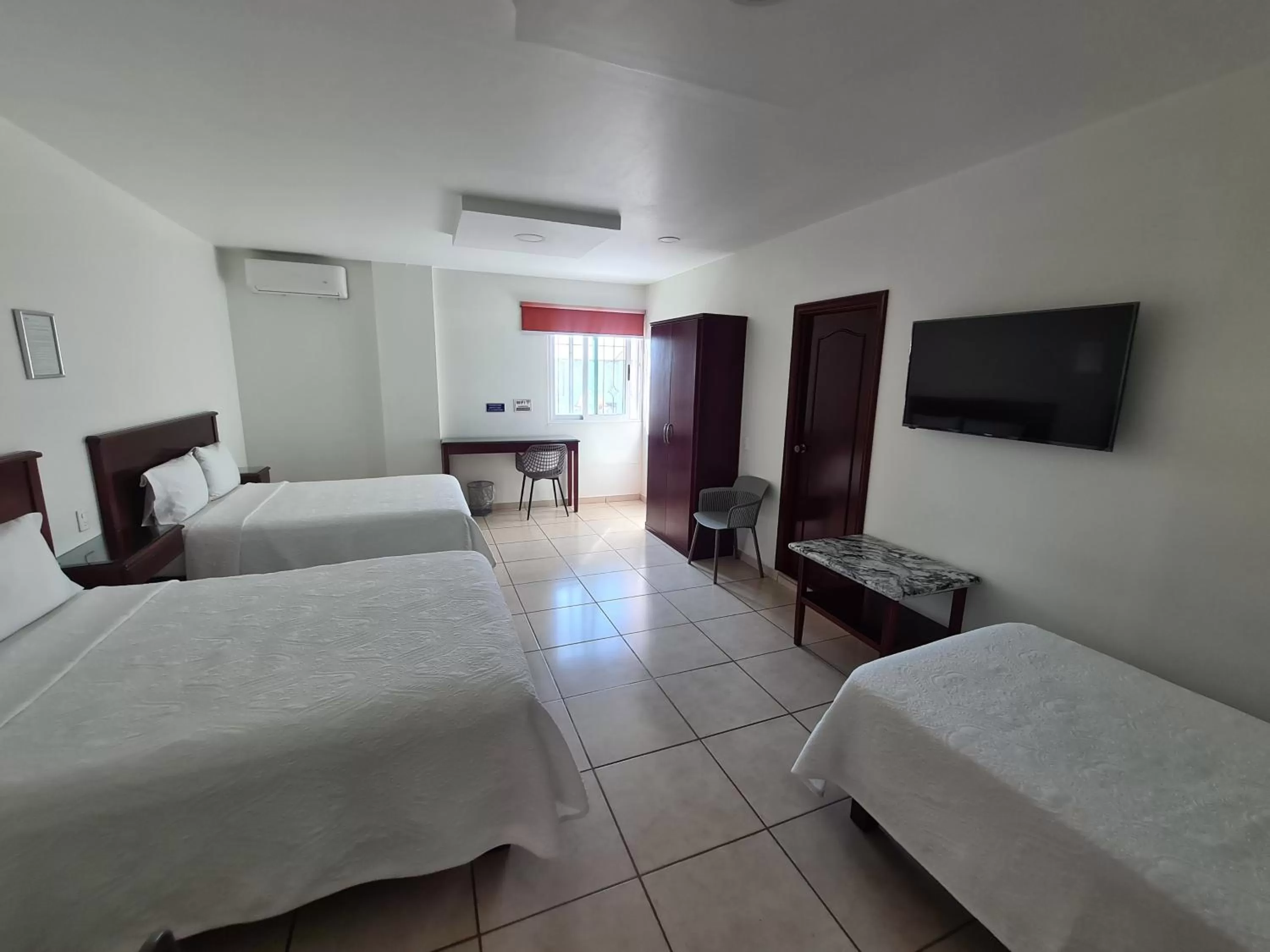 Bed in HOTEL FINA INN