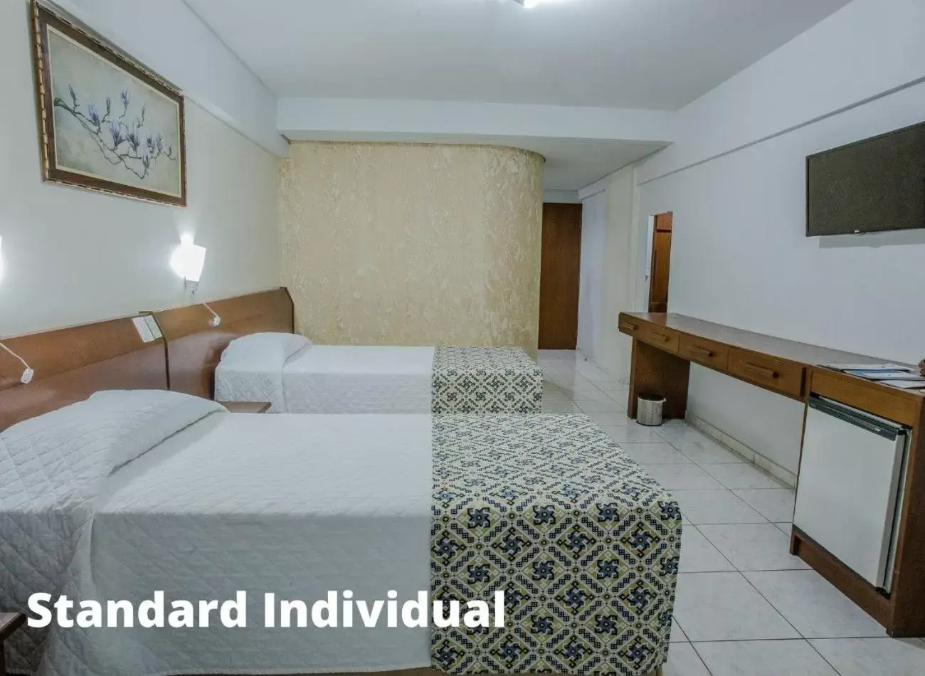 Bed in Foz Presidente Comfort Hotel