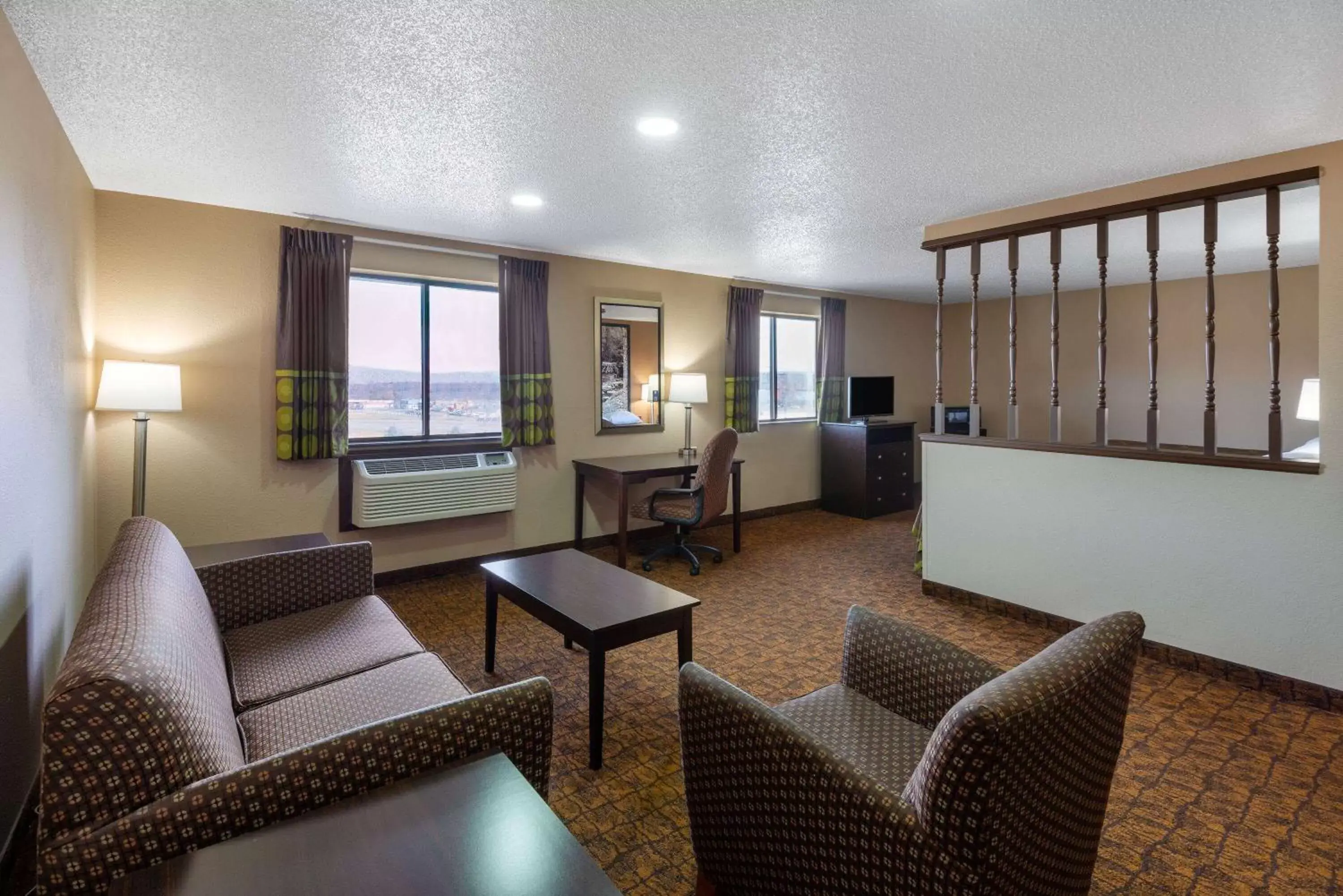 Bed, Seating Area in Super 8 by Wyndham Summersville