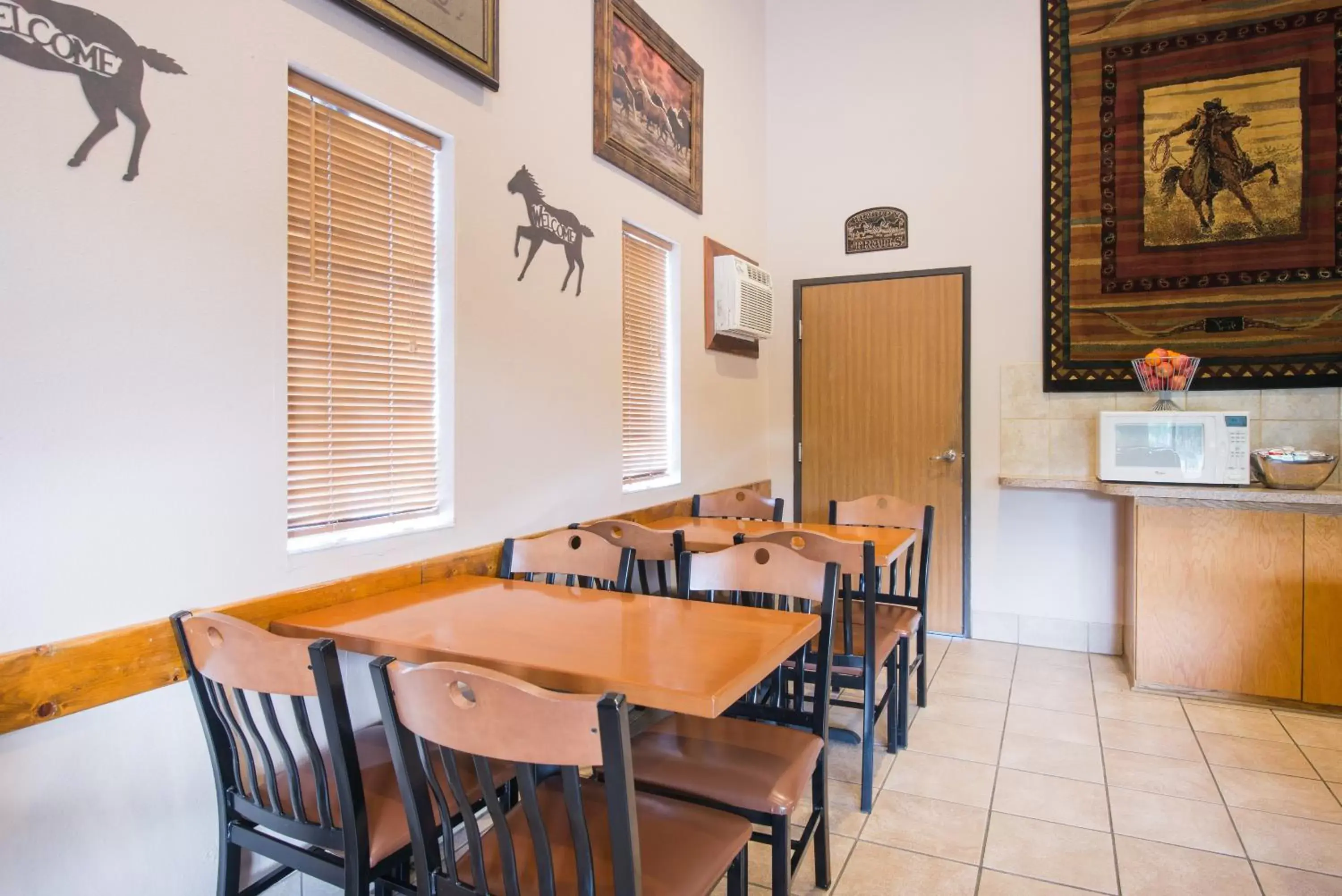 Lobby or reception, Dining Area in Super 8 by Wyndham Abilene KS