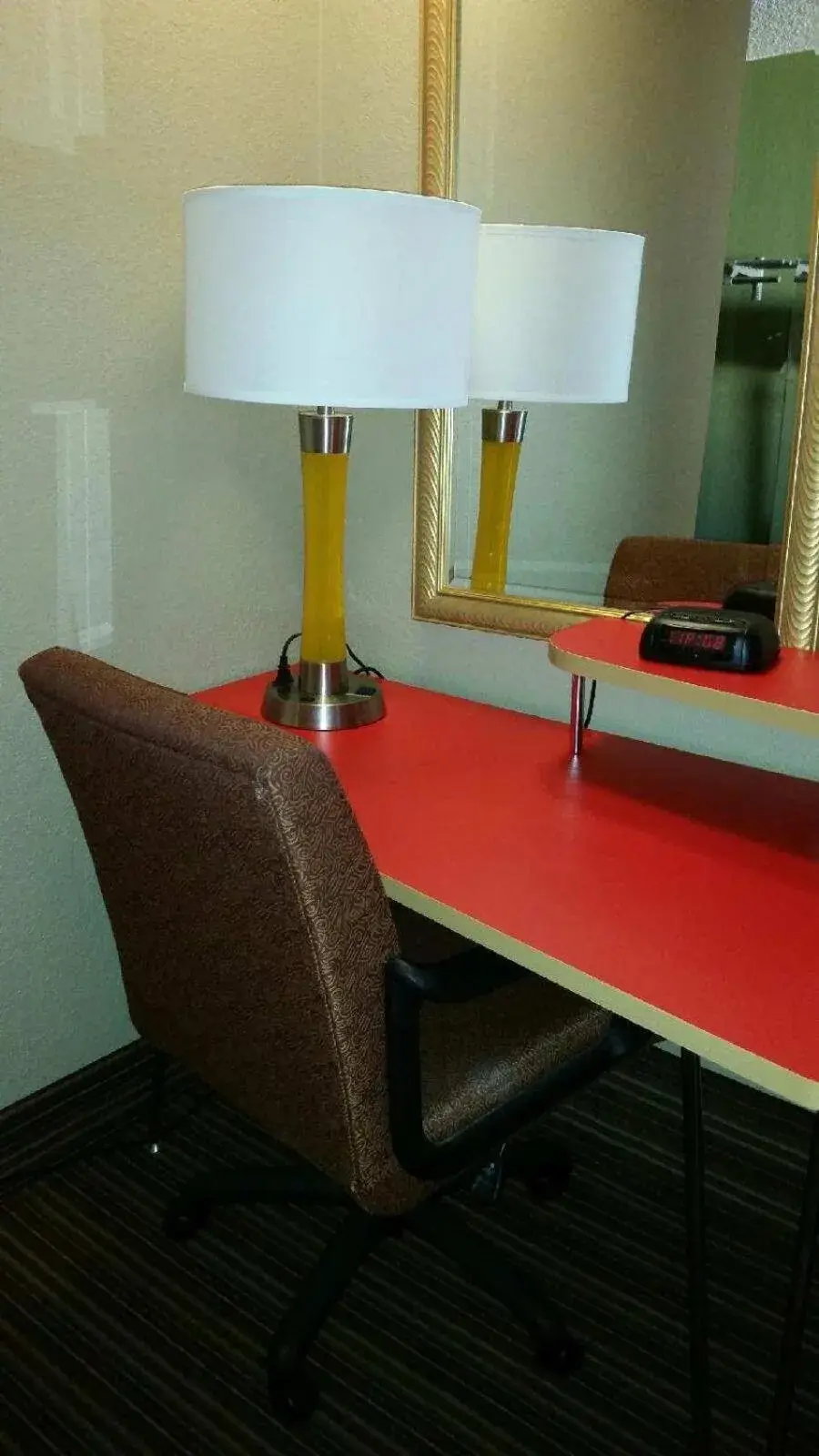 Seating area in Super 8 by Wyndham Denver Central