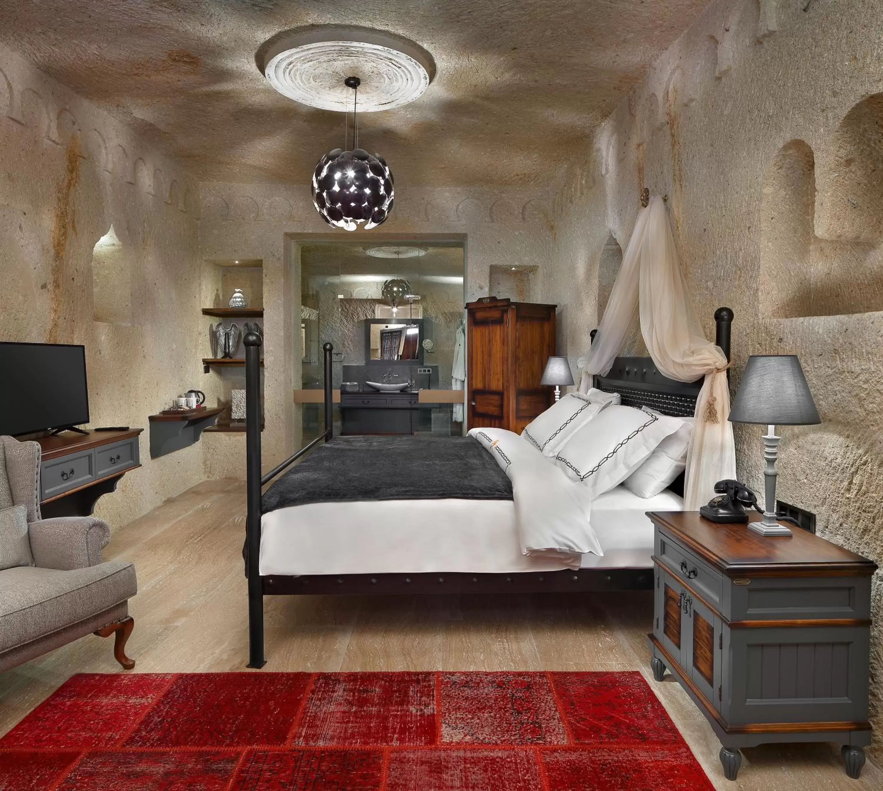 Bed in Seraphim Cave Suites & SPA