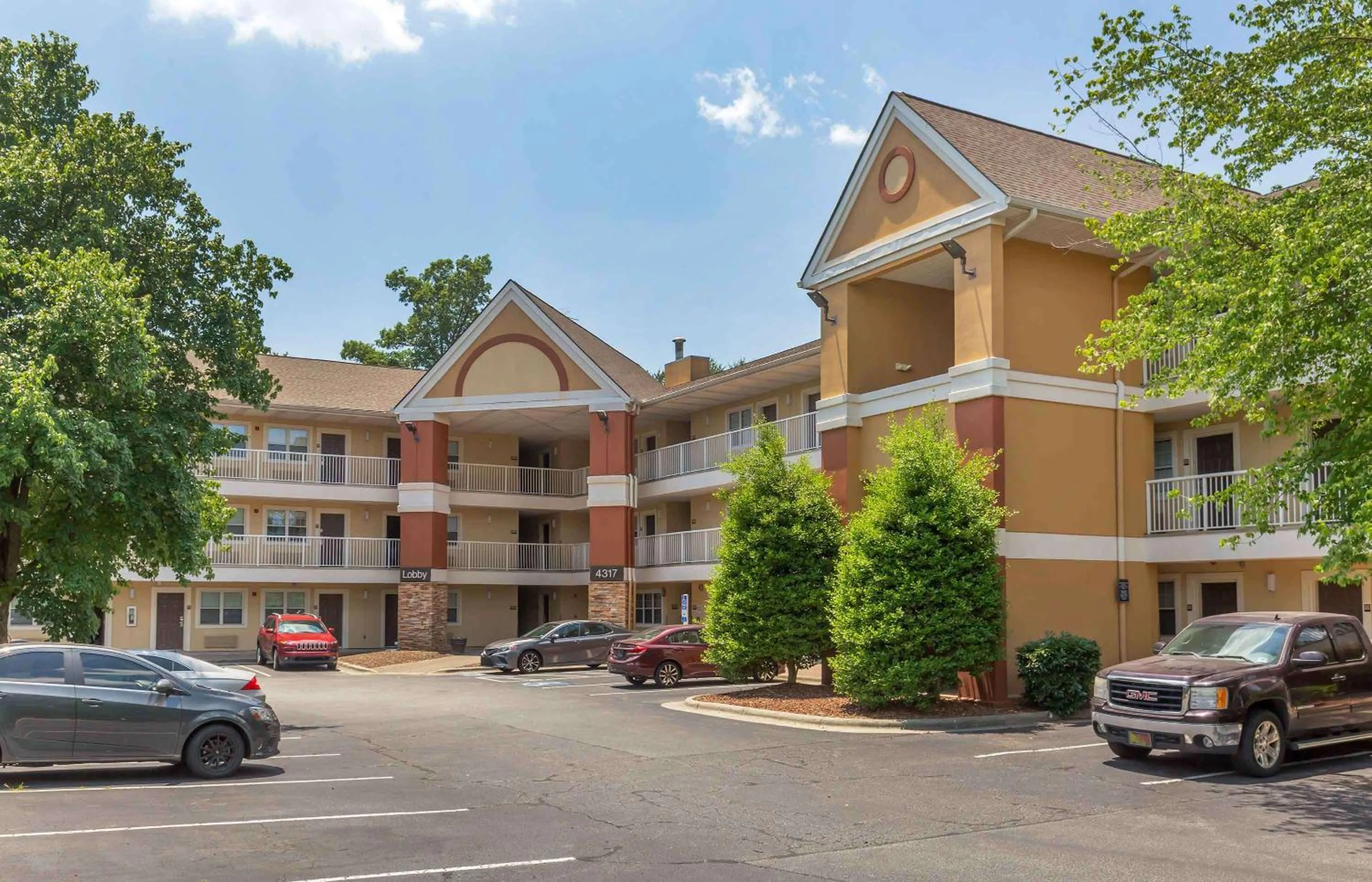 Property building in Extended Stay America Select Suites - Greensboro - Wendover Ave - Big Tree Way