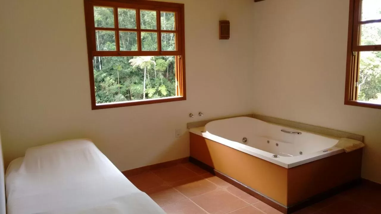 Bed in Pousada Mariza