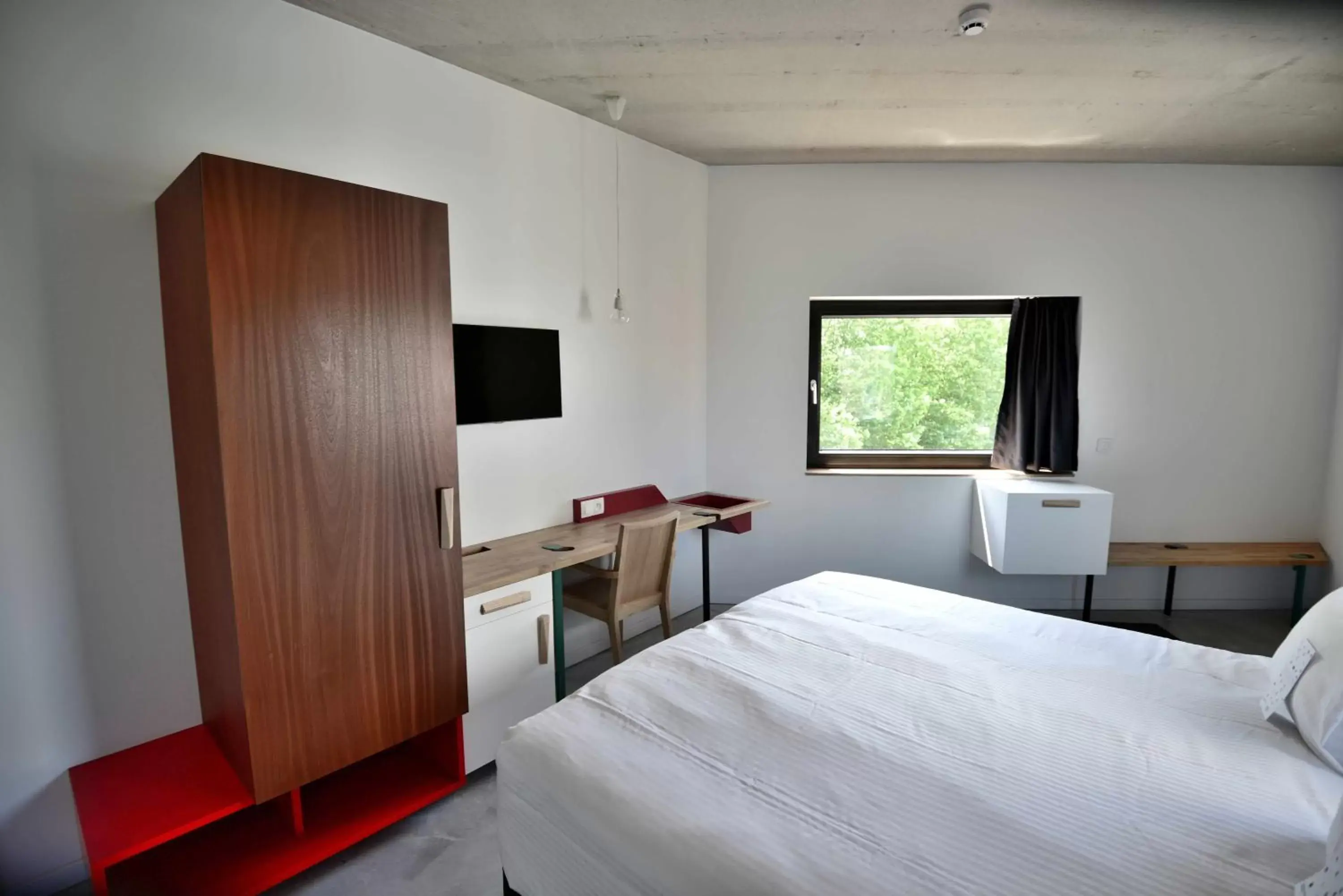 Day, Bed in Hôtel Belvue Day, Bed in Hôtel Belvue