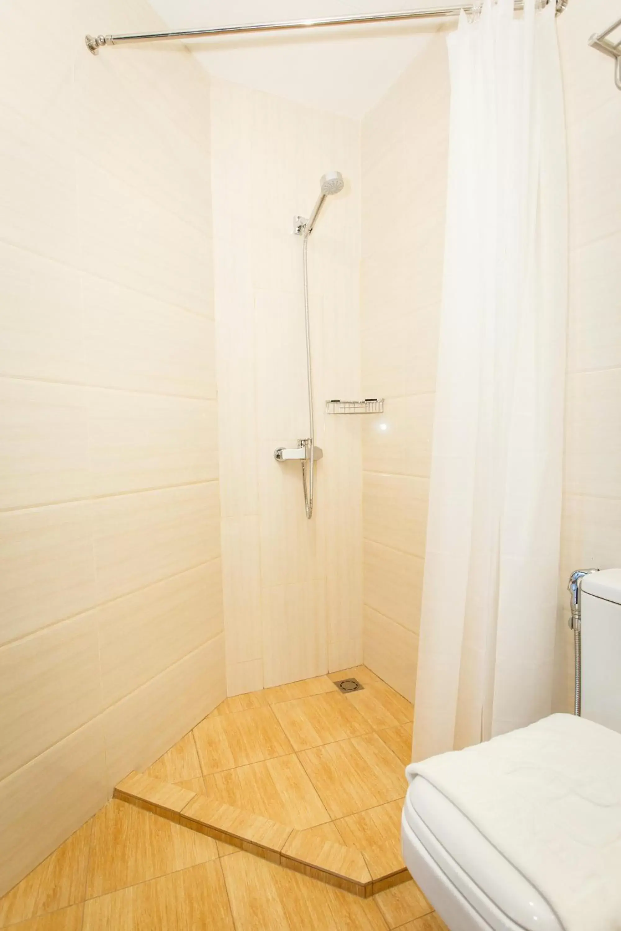 Bathroom in Lintas Platinum Hotel Bathroom in Lintas Platinum Hotel