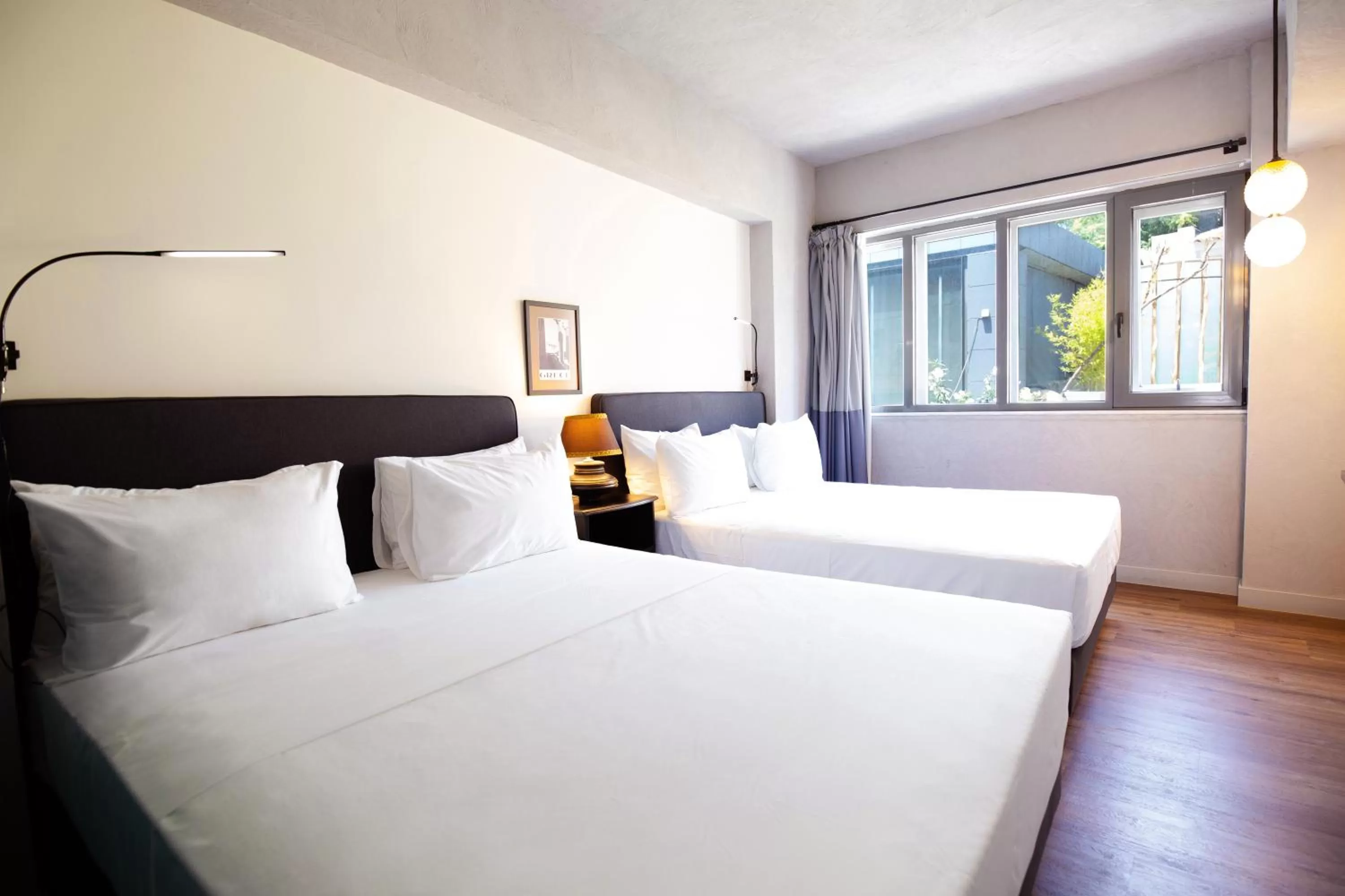 Bed in Downtown Athens Lofts - The Acropolis Observatory