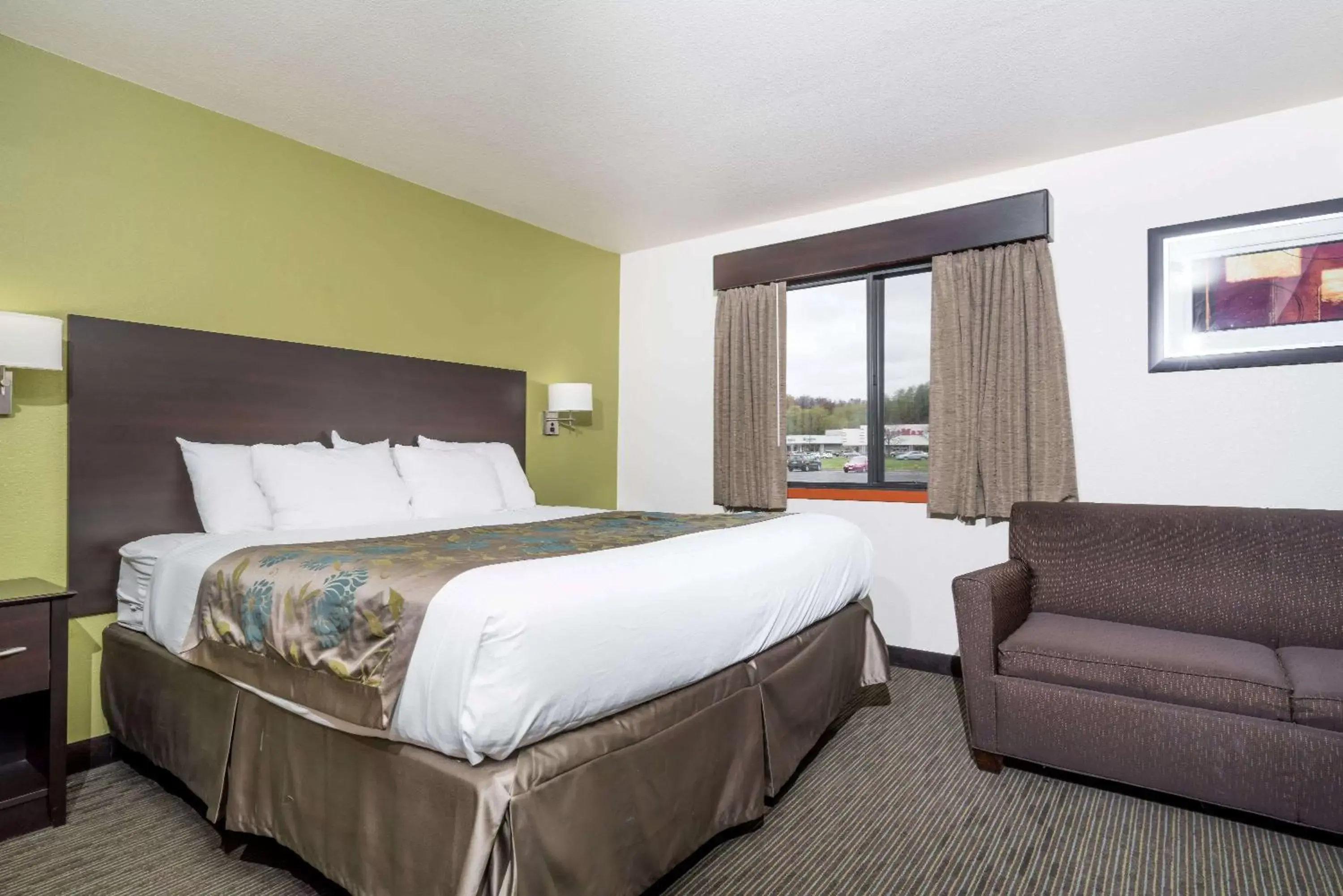 Photo of the whole room, Bed in Baymont by Wyndham Eau Claire WI