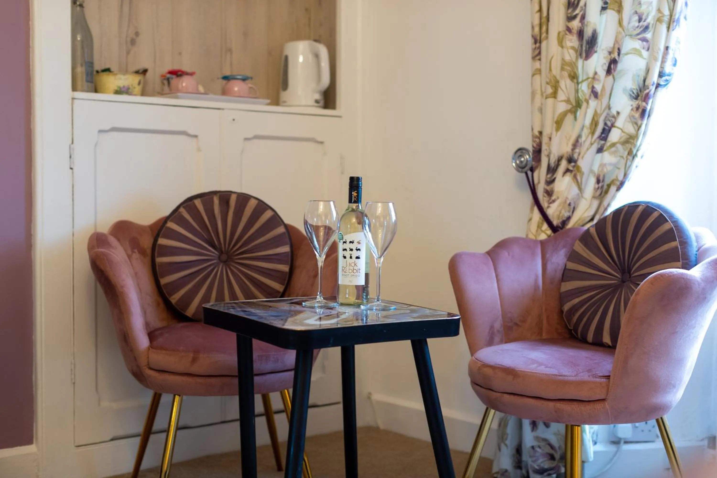 Seating area in Holly Lodge Guest House with FREE off site health club
