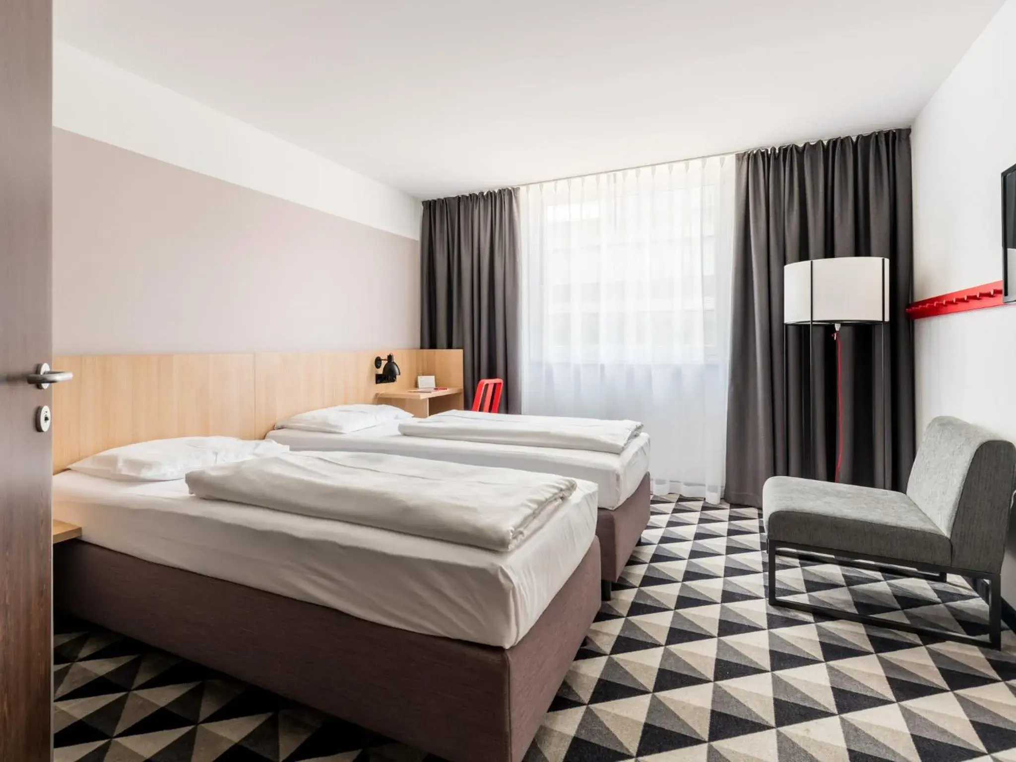 Bed in acom-Hotel Vienna