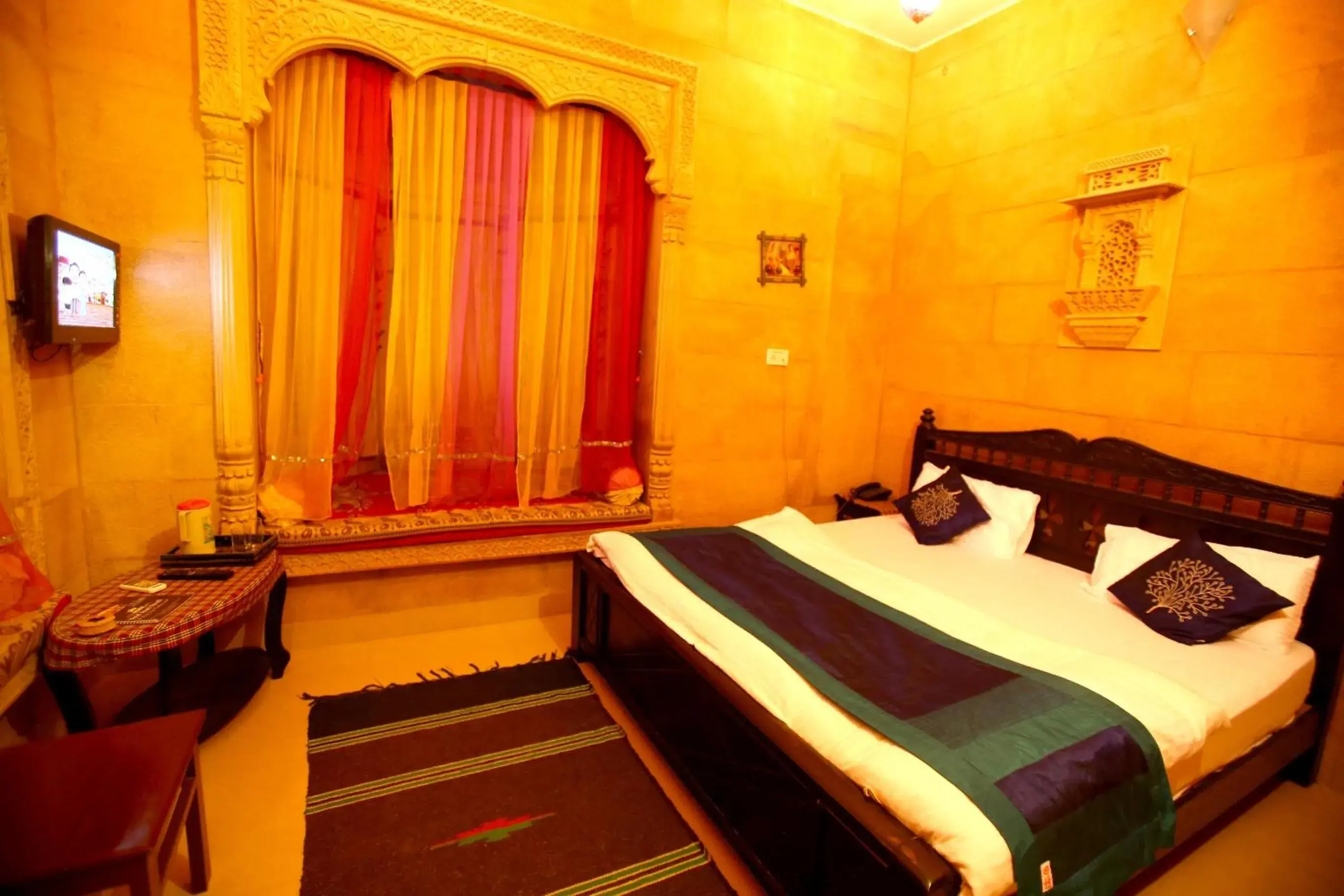 Bed in Hotel Royal Haveli