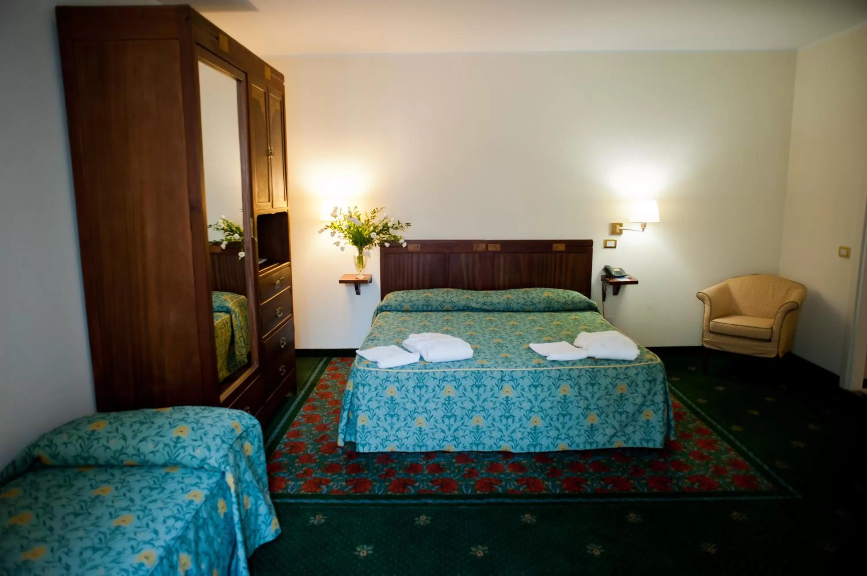 Bed in Hotel Candiani