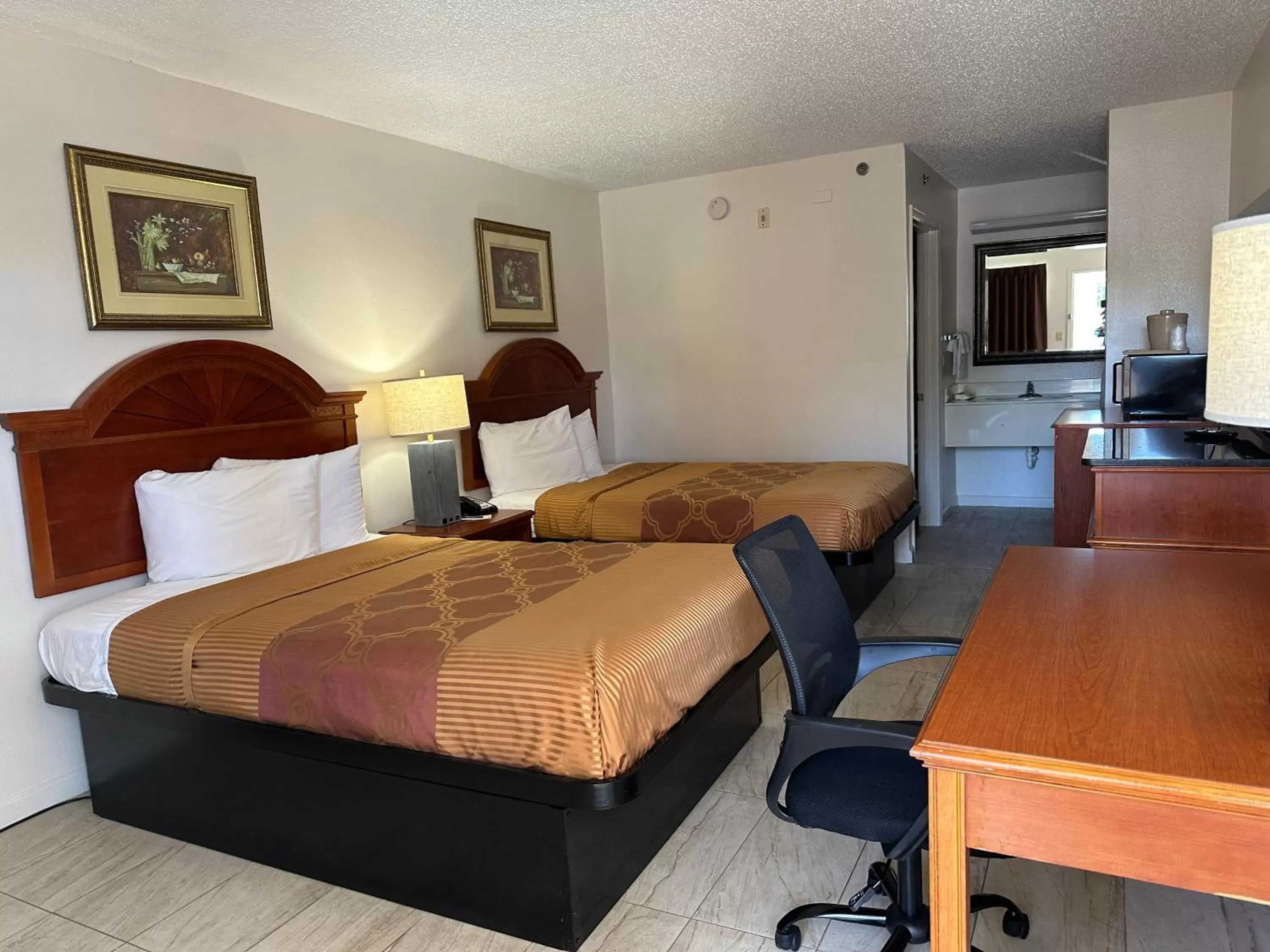 Photo of the whole room in Carom Inn a Travelodge by Wyndham Denham Springs-Baton Rouge