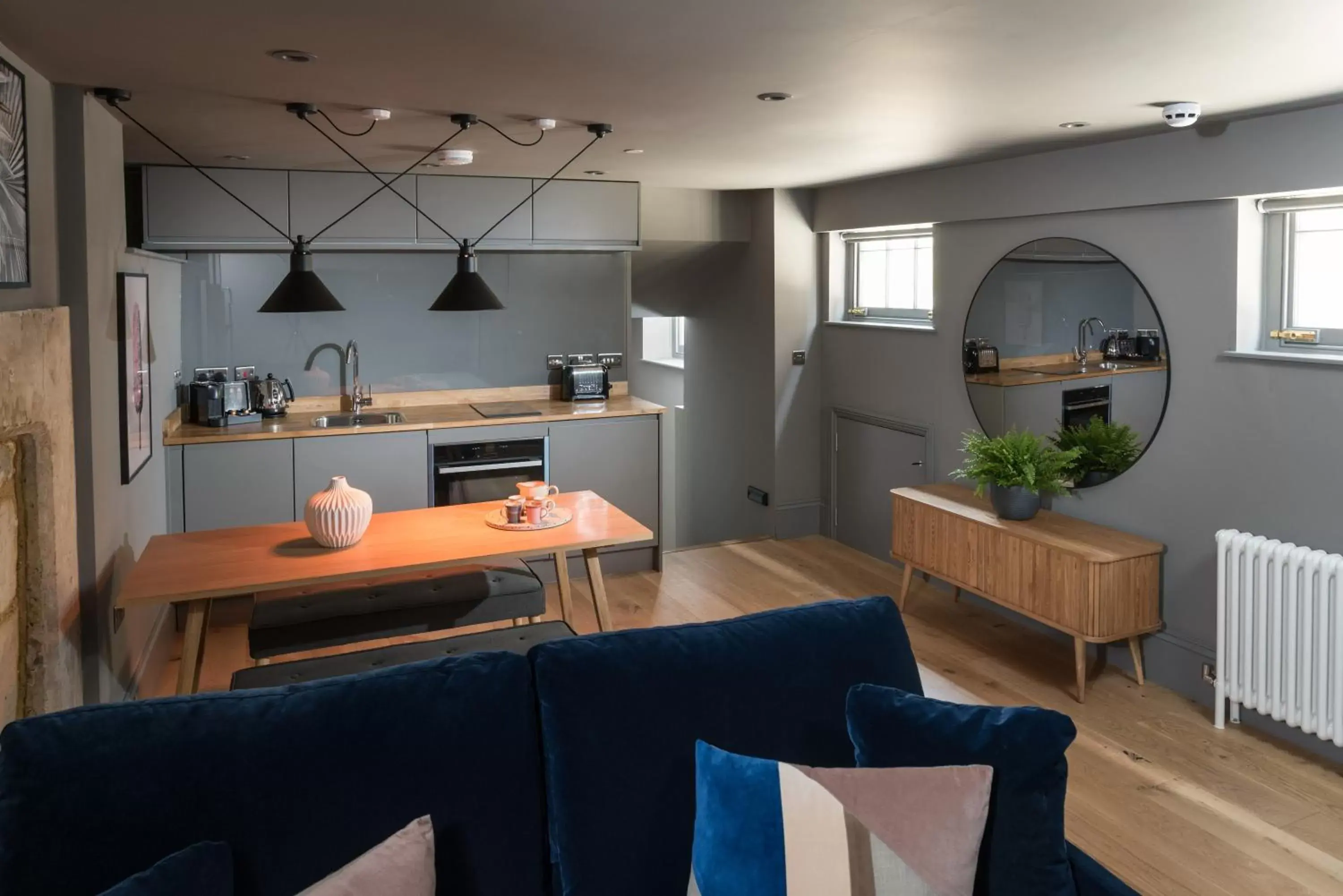 Kitchen/Kitchenette in Hiding Space - Trim Street Apartments