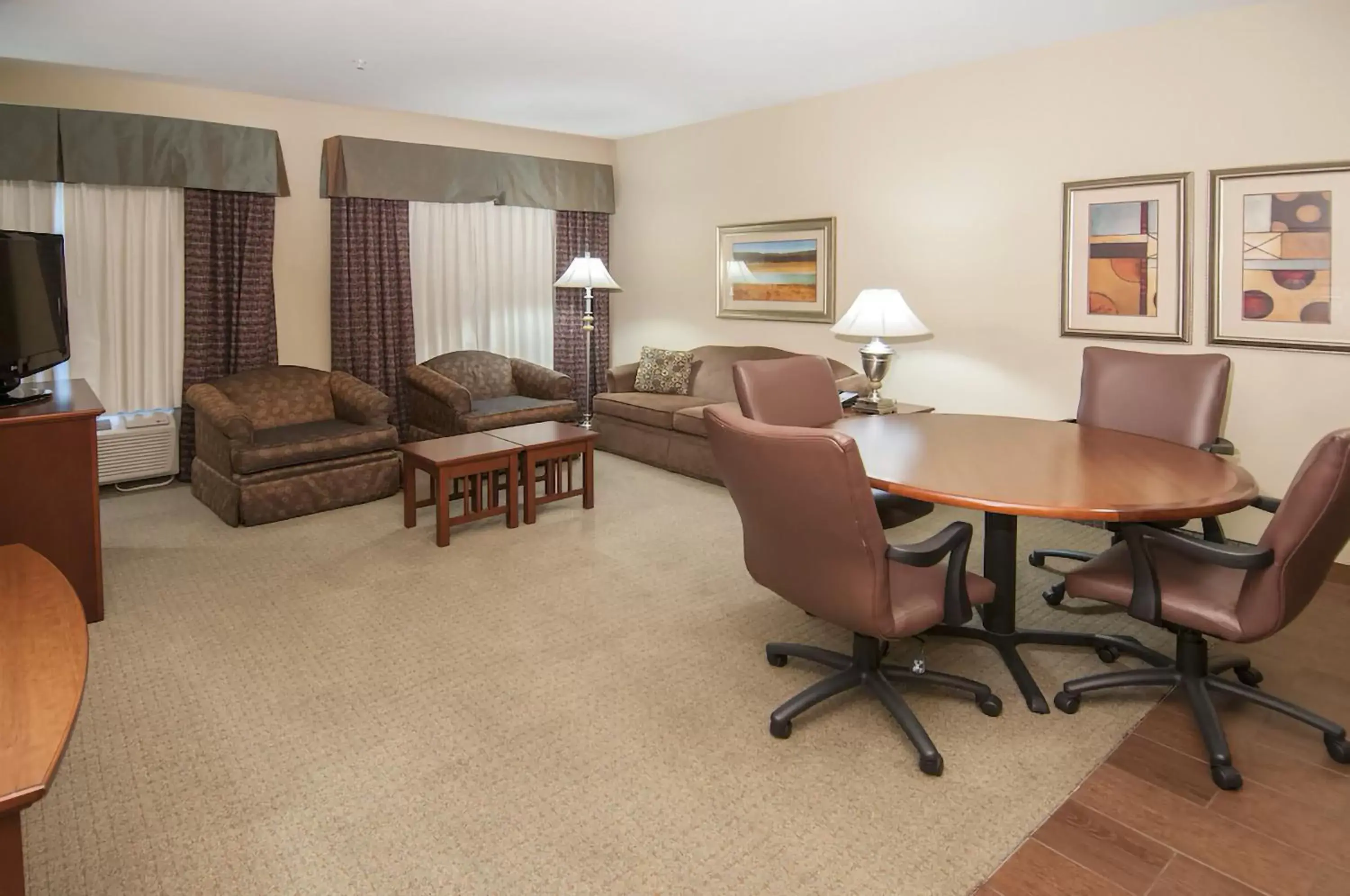 Living room, Seating Area in WeStay Suites - Covington/Mandeville