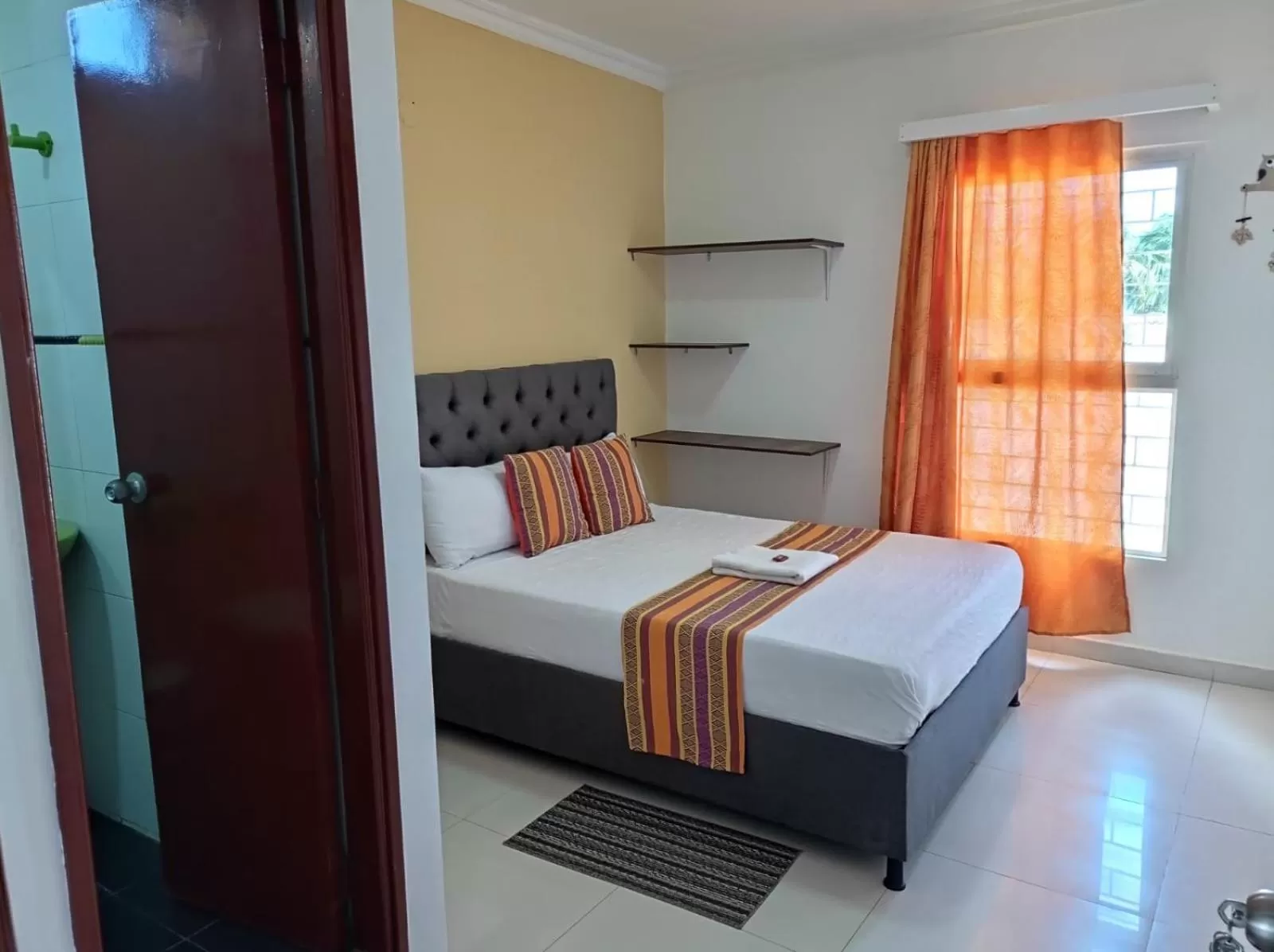 Bed in ANAJIRAWAA HOTEL