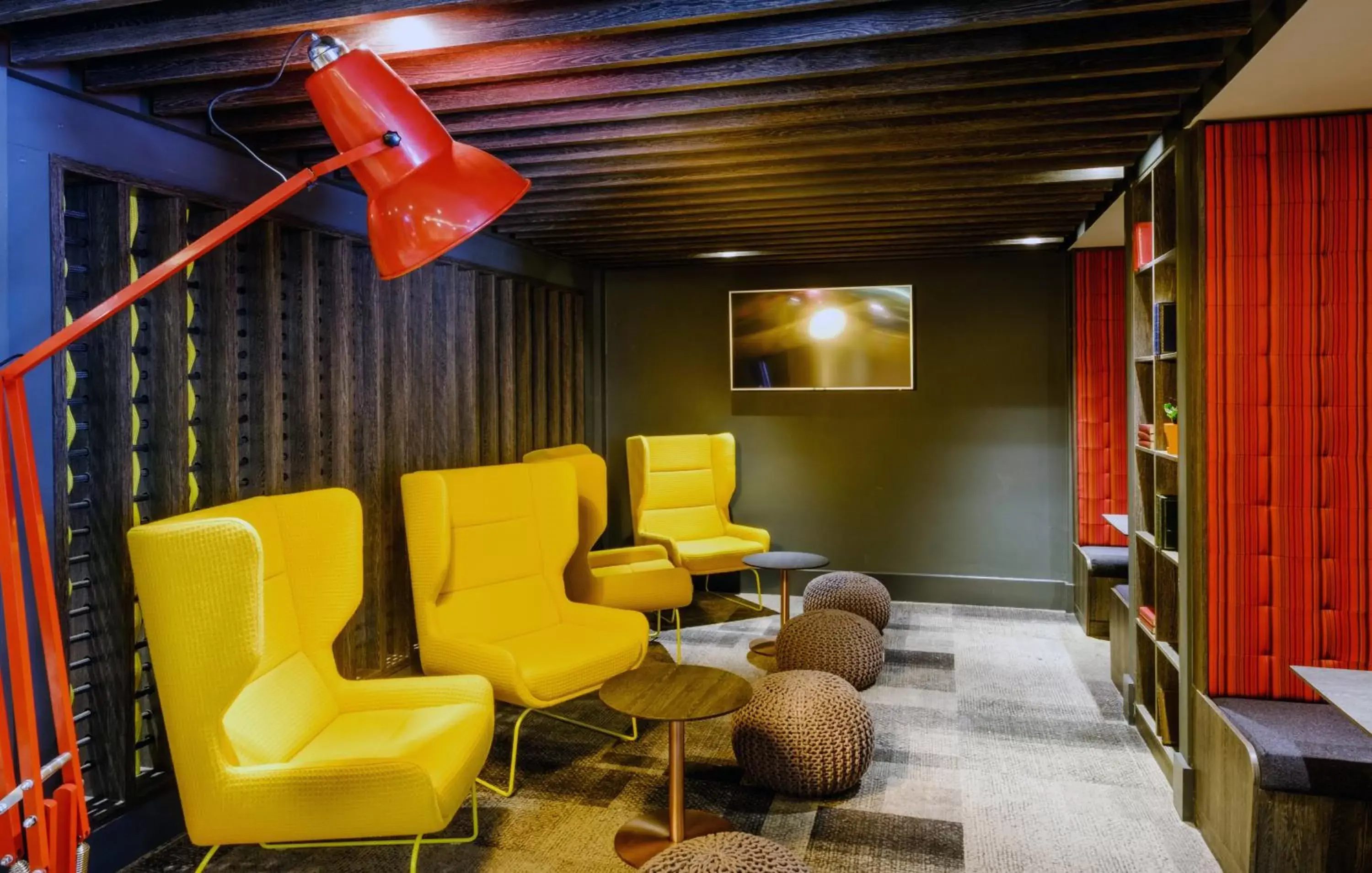 Communal lounge/ TV room in ibis Styles Leeds City Centre Arena