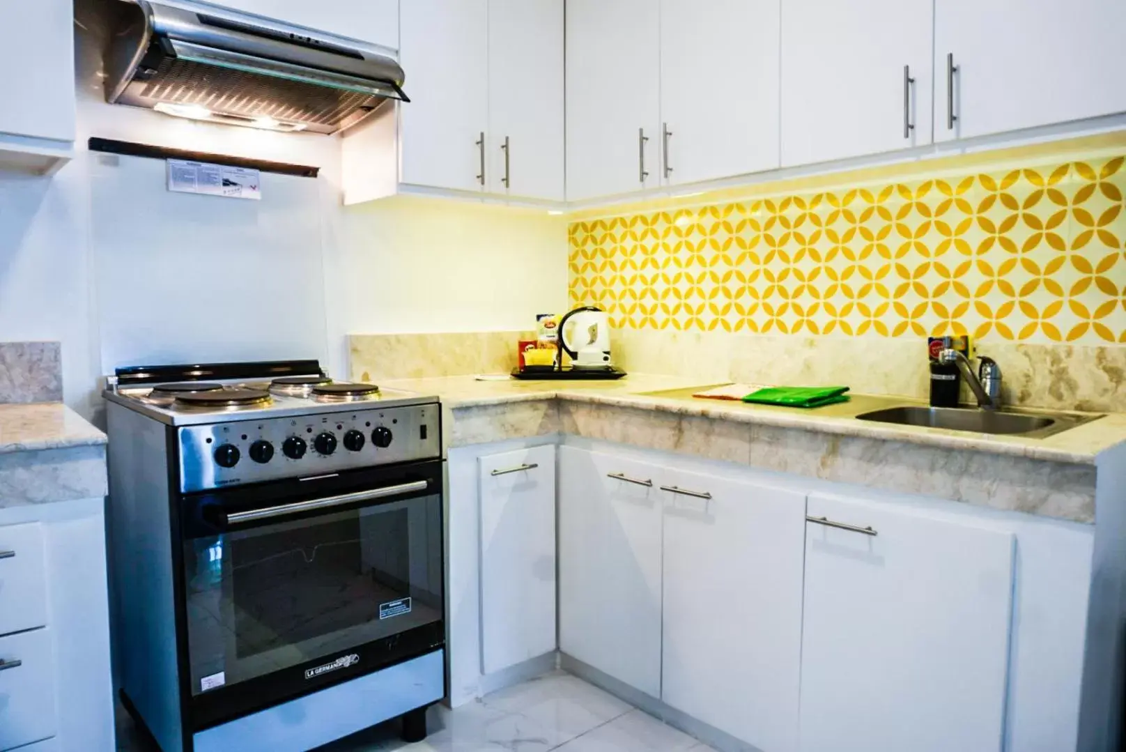 kitchen, Kitchen/Kitchenette in Parque España Residence Hotel Managed by HII