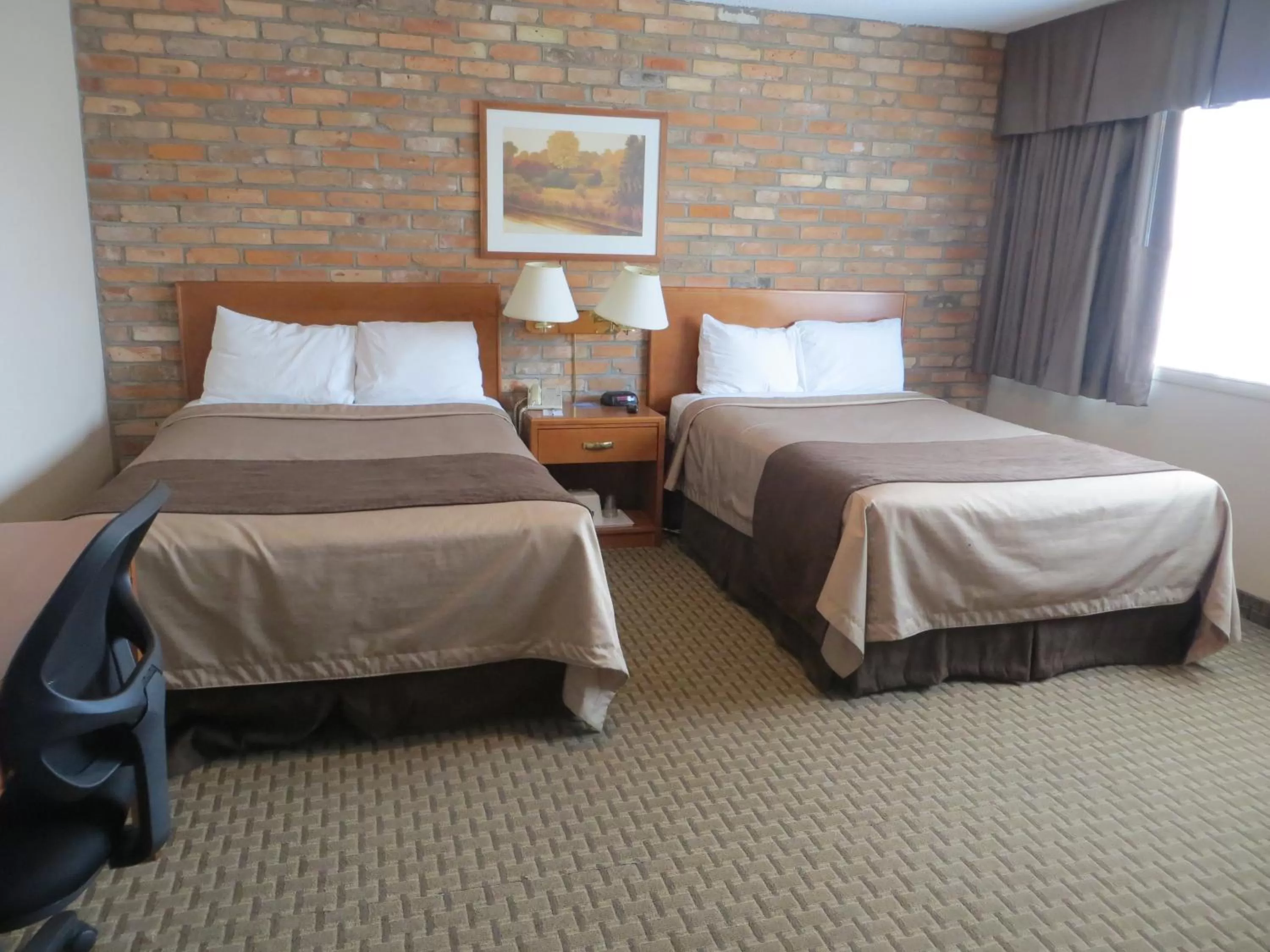 Bed in Travelodge by Wyndham Thunder Bay ON