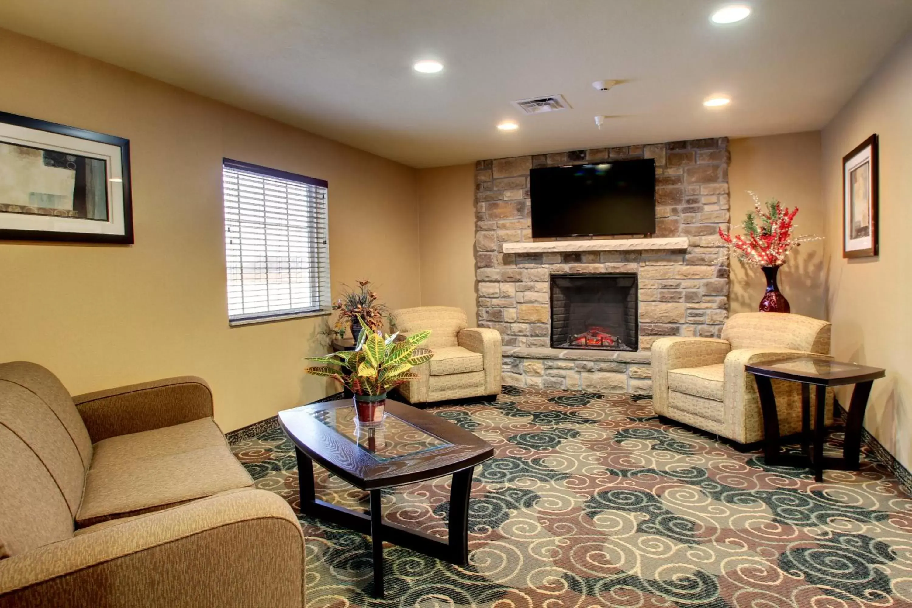 Communal lounge/ TV room, Seating Area in Cobblestone Hotel & Suites - Charlestown