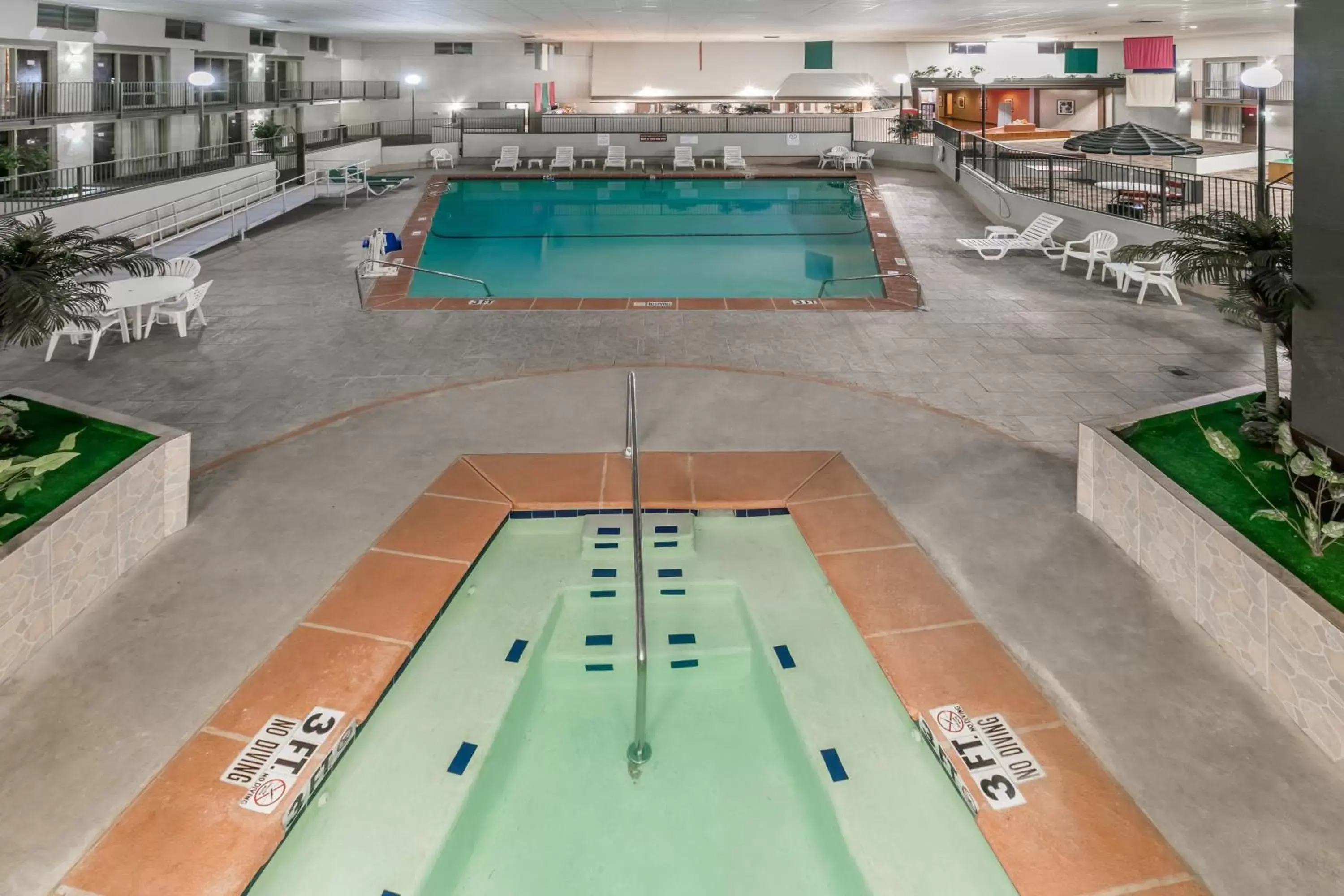 Swimming Pool in Ramada by Wyndham Odessa Near University of Texas Permian