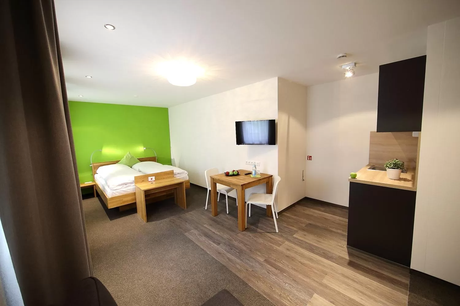 Bed in Schieners Hotel & Apfelhof Apartments