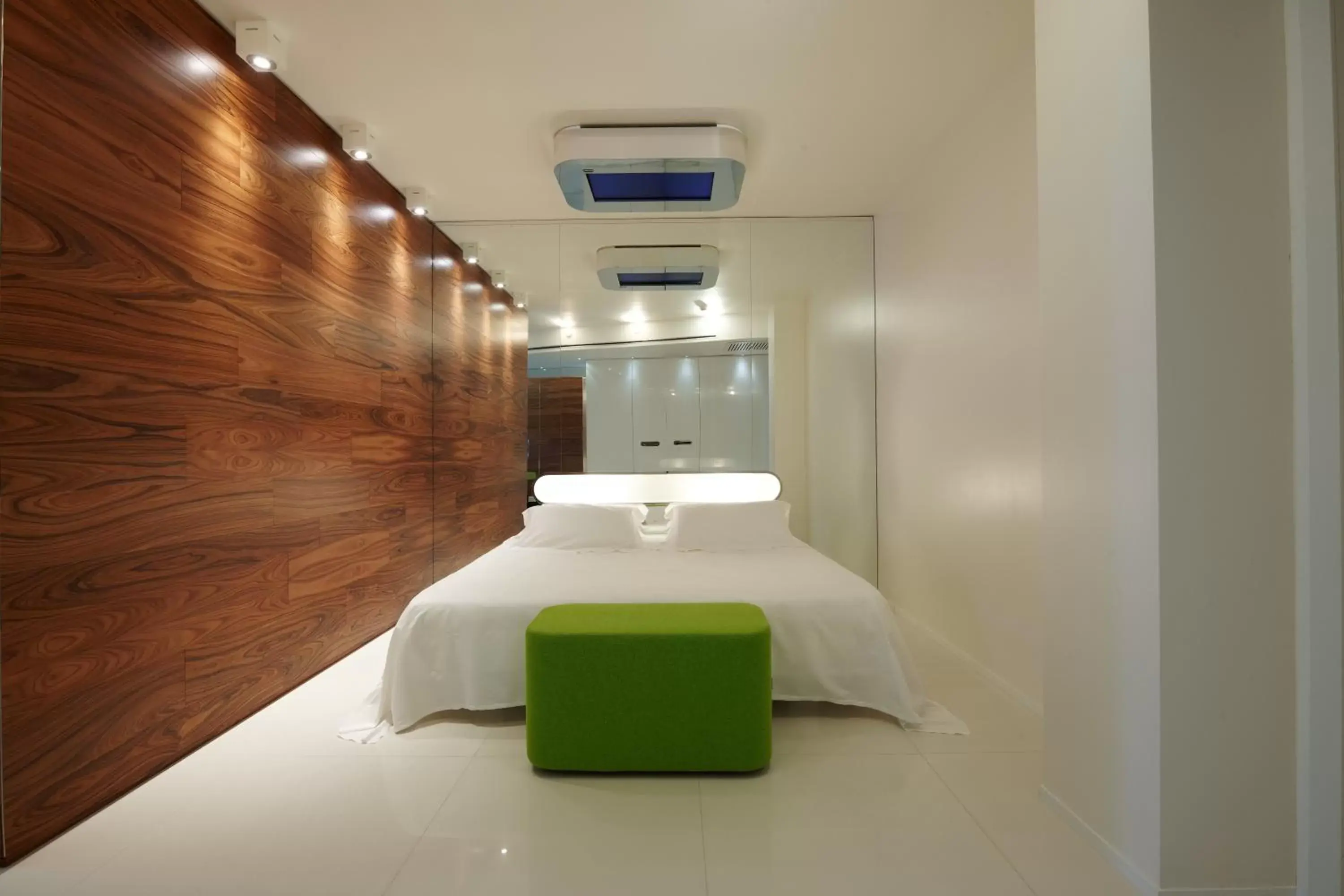 Bedroom, Bathroom in i-Suite Hotel