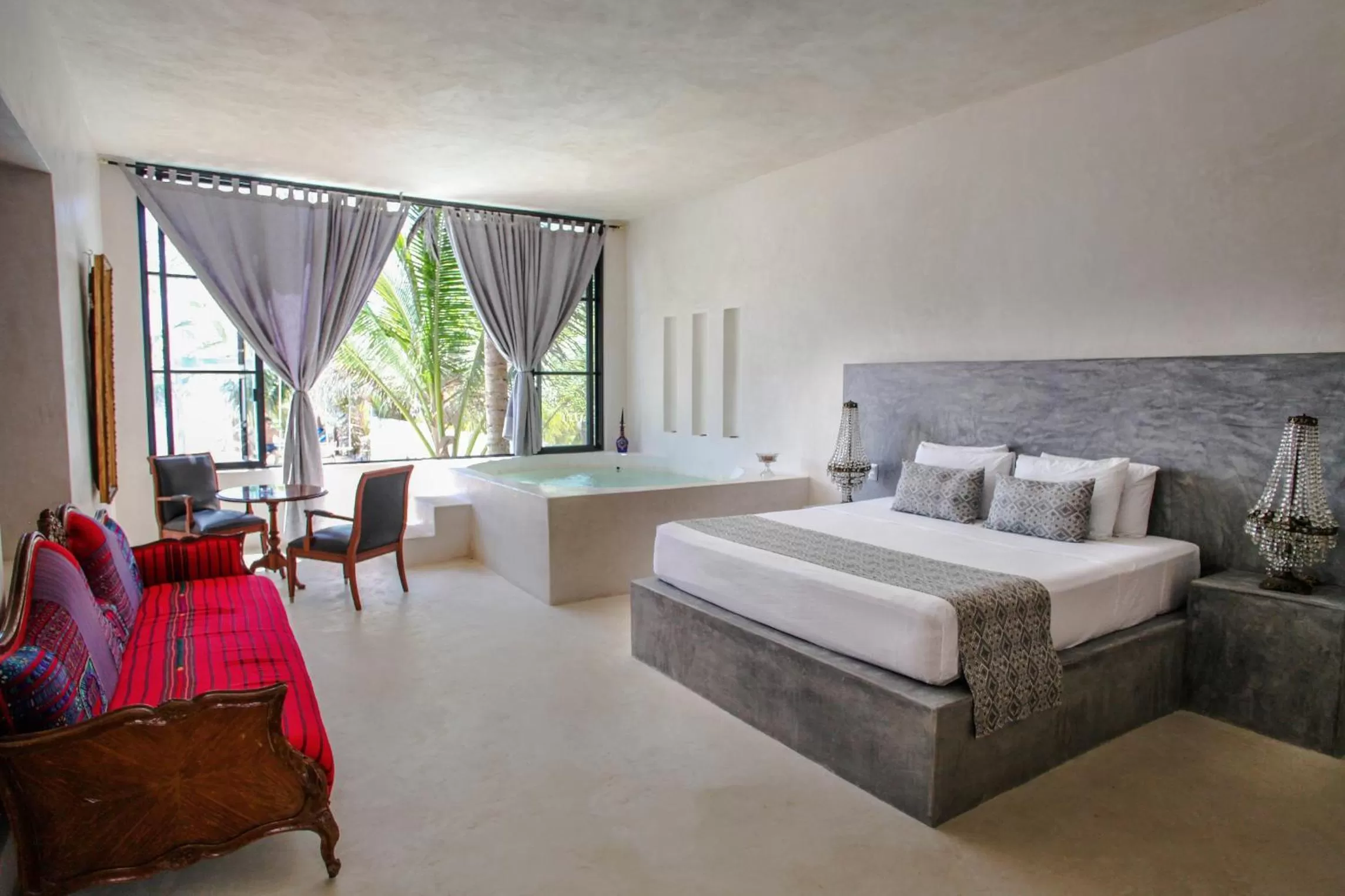 Bed in Posada Lamar Tulum Beach Front and Pool