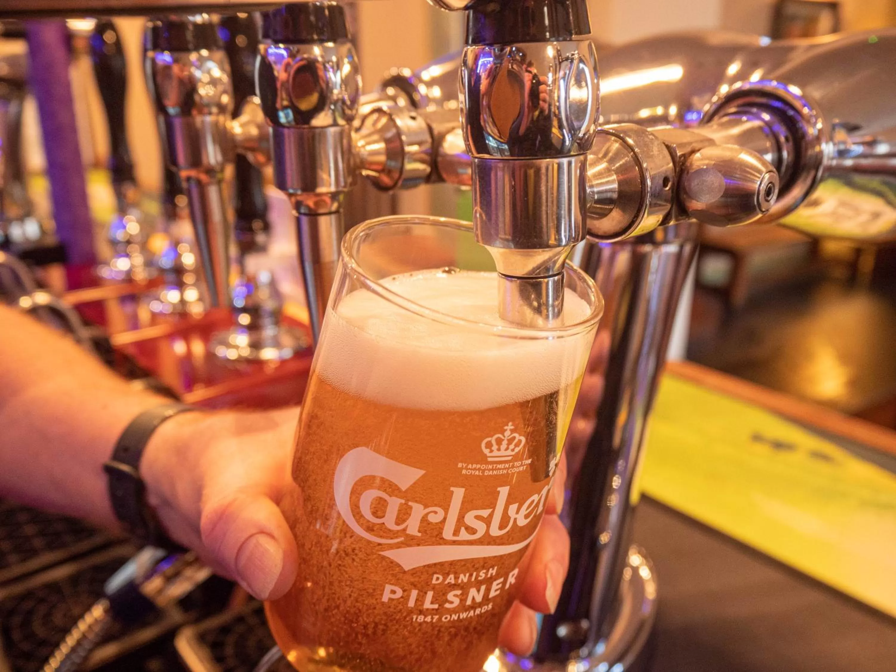 Communal lounge/ TV room in Glan Aber Hotel