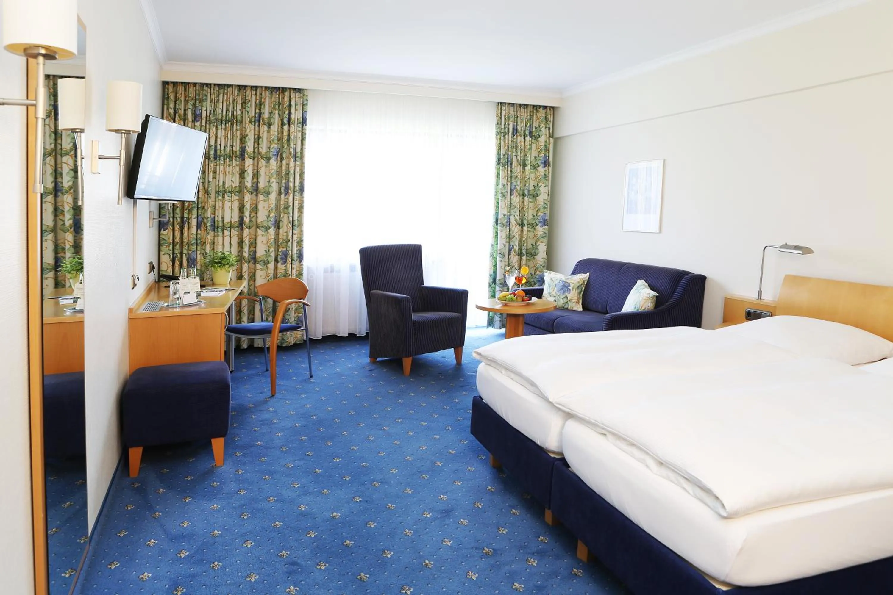 Living room, Bed in Flair Hotel Dobrachtal