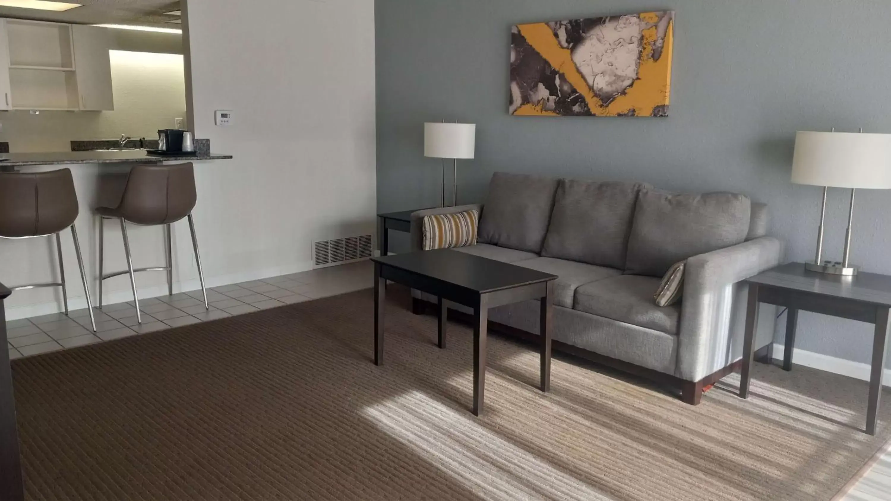 Bedroom, Seating Area in Best Western Downtown Casper Hotel