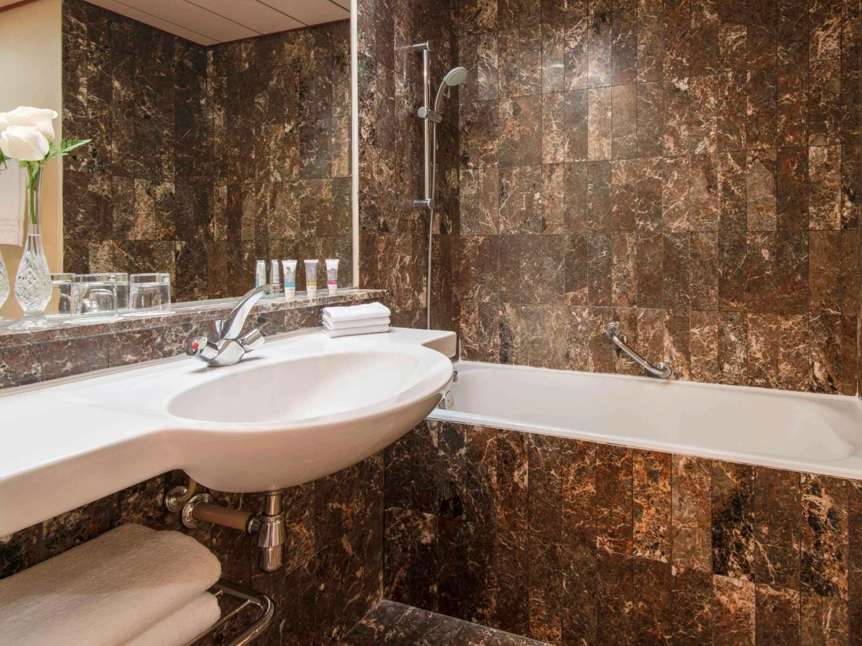 Photo of the whole room, Bathroom in M Grand Hotel Doha