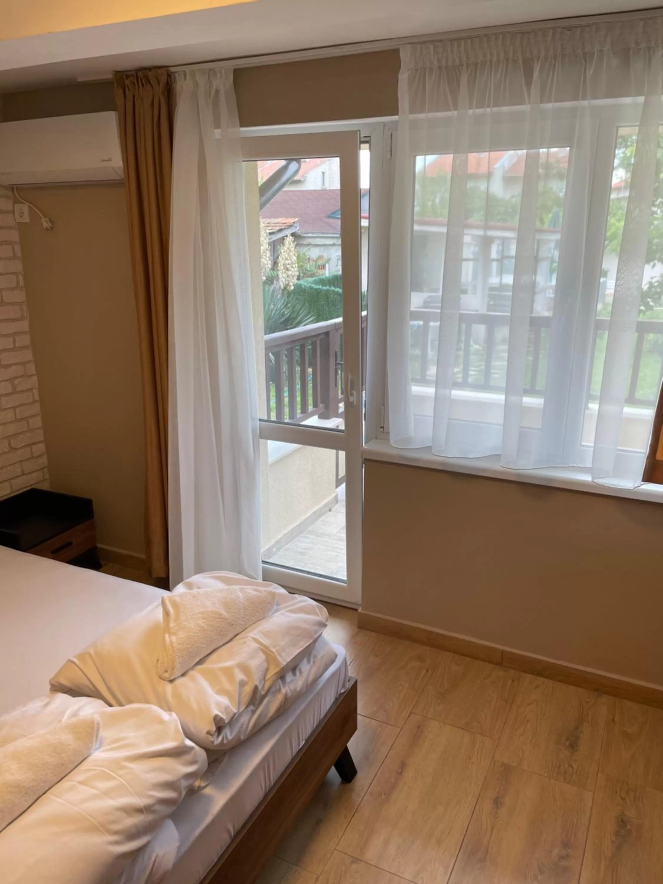 Bed in Family Hotel Malibu