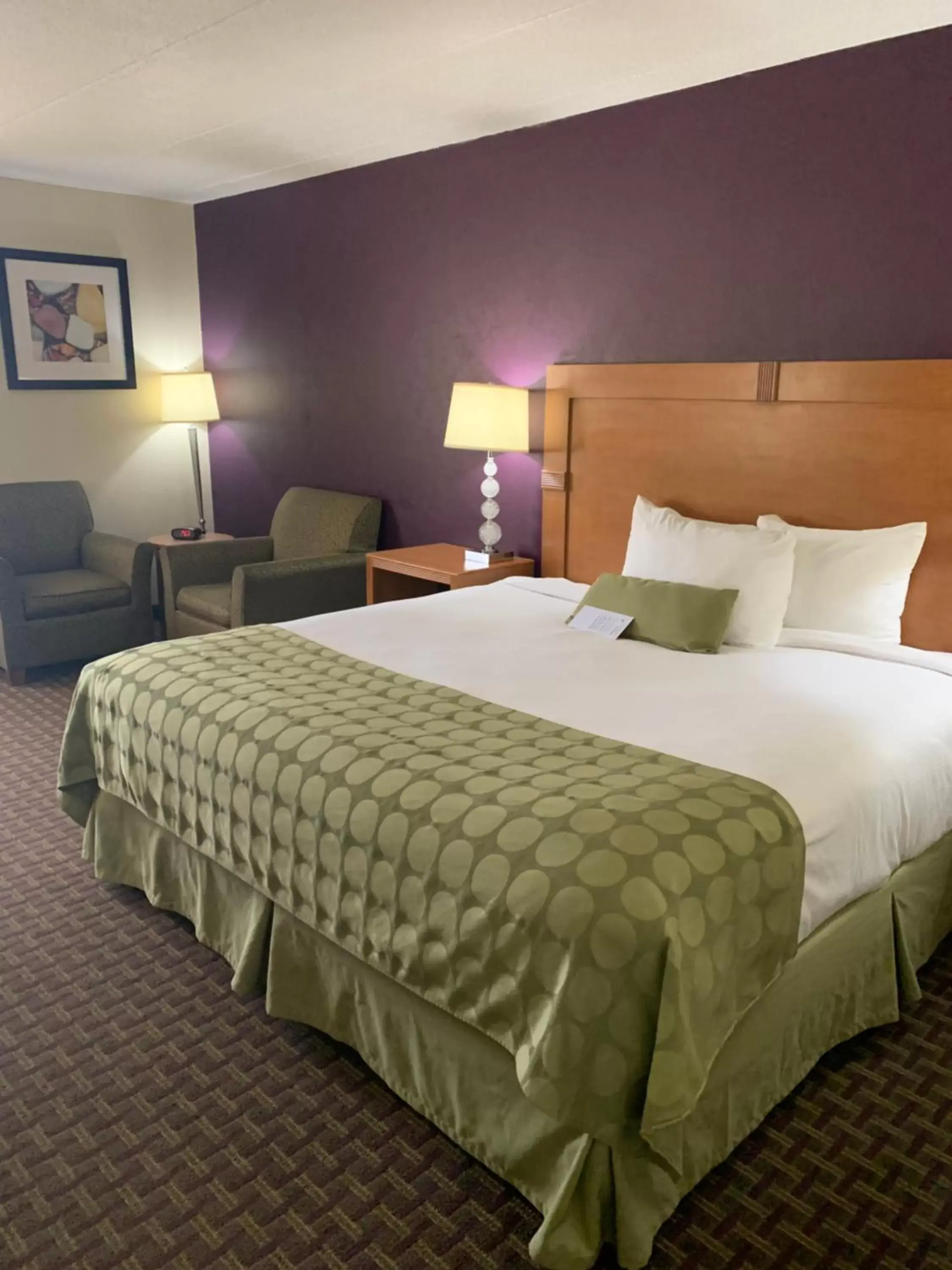 Bed in Ramada by Wyndham Marquette