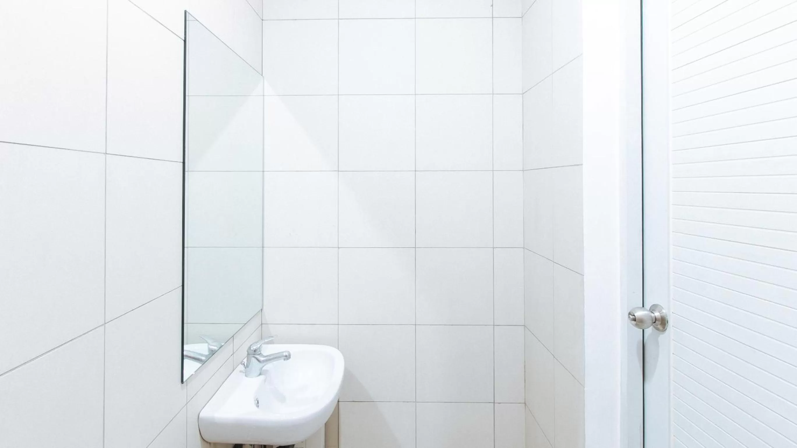 Bathroom in Sans Hotel Laperal Manila