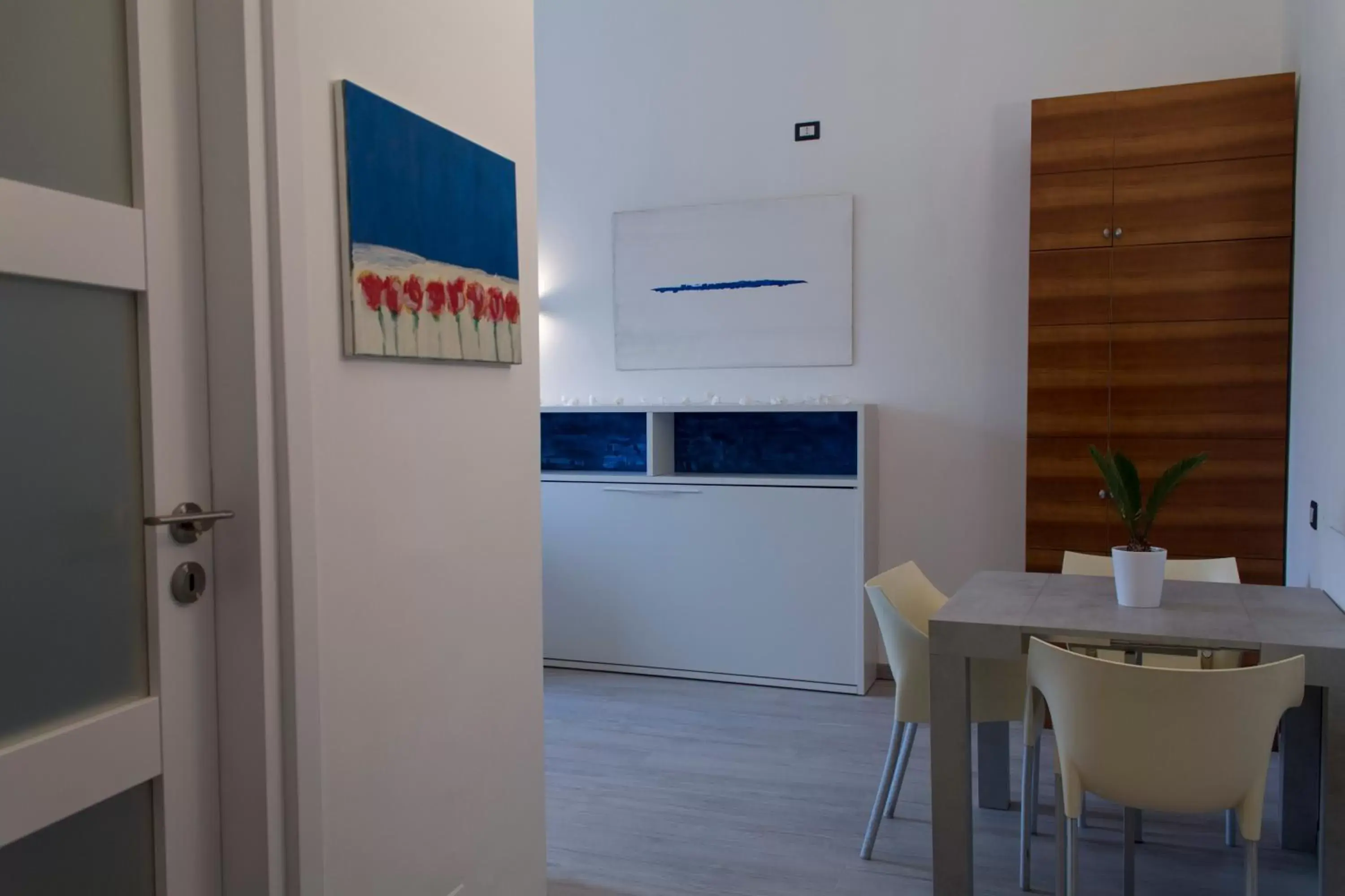 Dining area, Kitchen/Kitchenette in Hotel Europa Varese