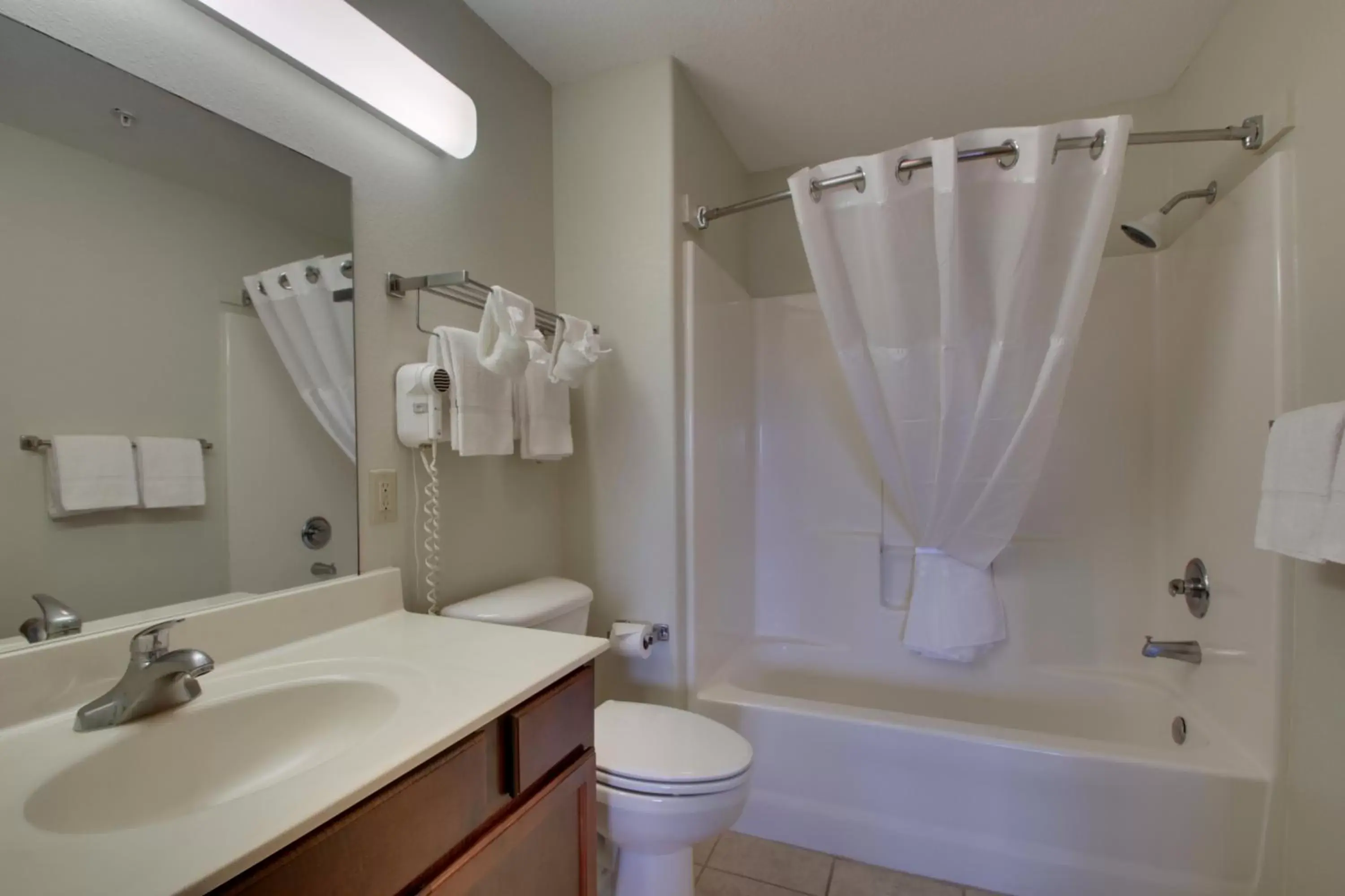 Bathroom in All Towne Suites