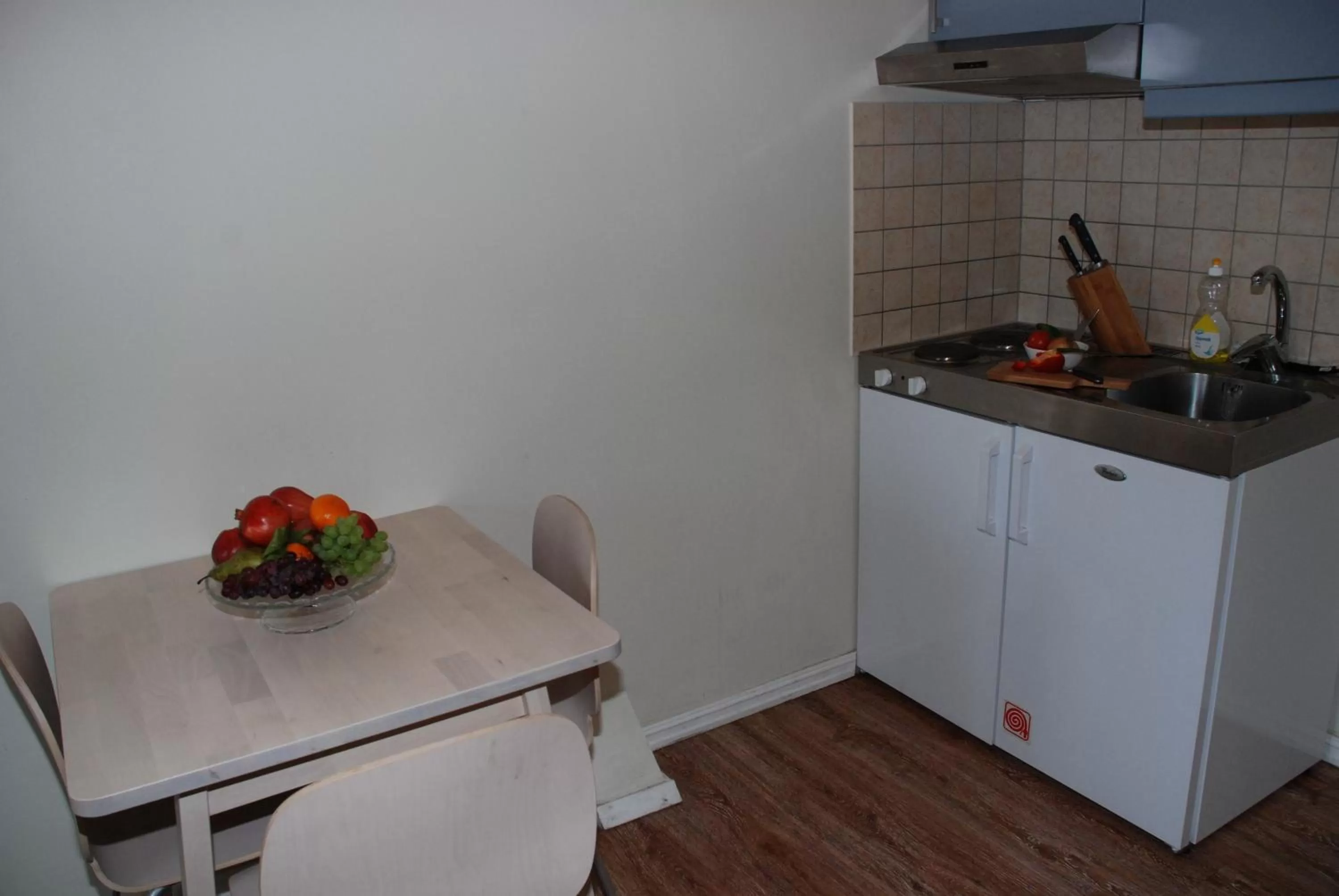 Kitchen or kitchenette in Central City Apartments